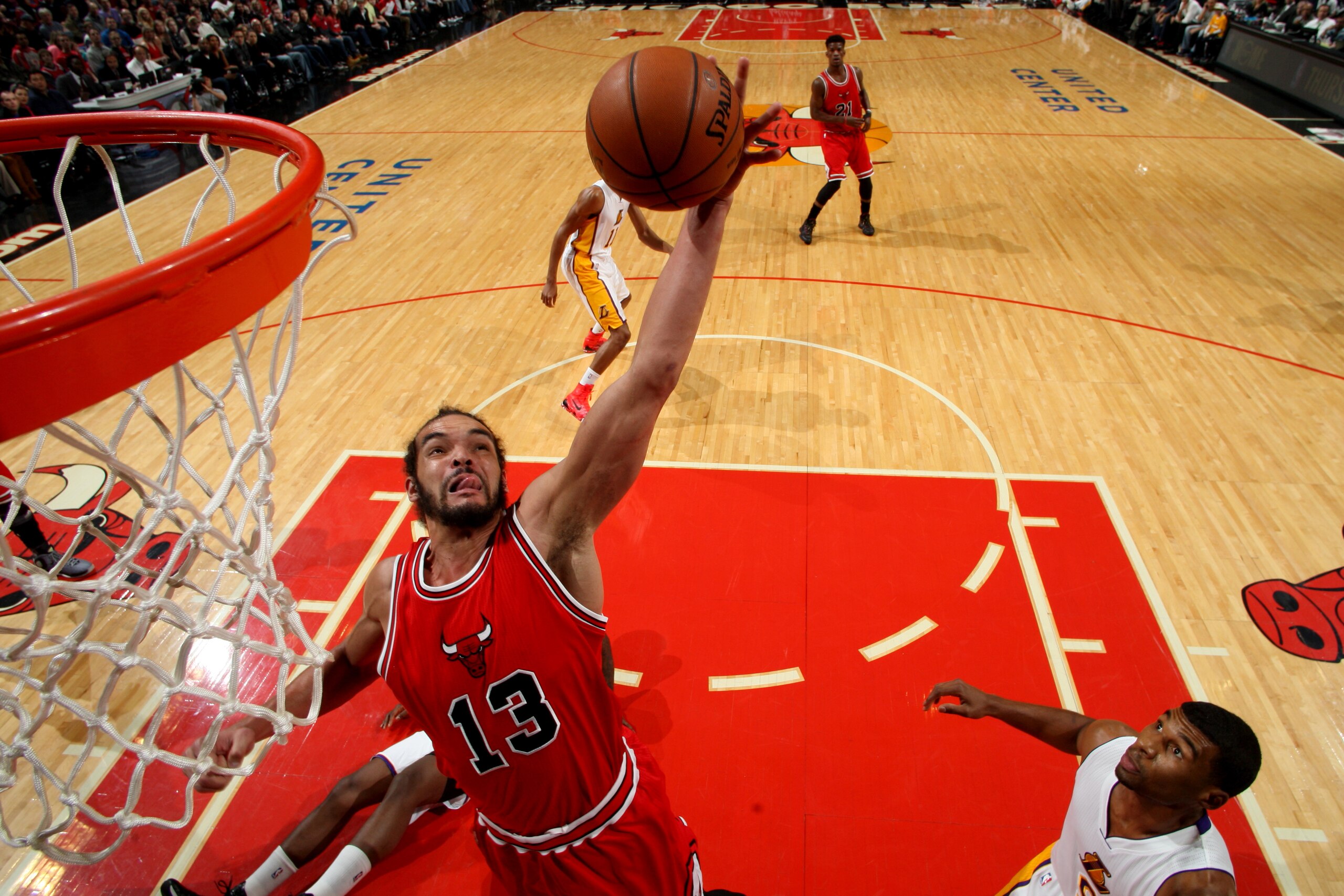 CHICAGO, IL - DECEMBER 25: Joakim Noah #13 of the Chicago Bulls goes up for a shot during a game against the Los Angeles Lakers at the United Center on December 25, 2014 in Chicago, Illinois. NOTE TO USER: User expressly acknowledges and agrees that, by d
