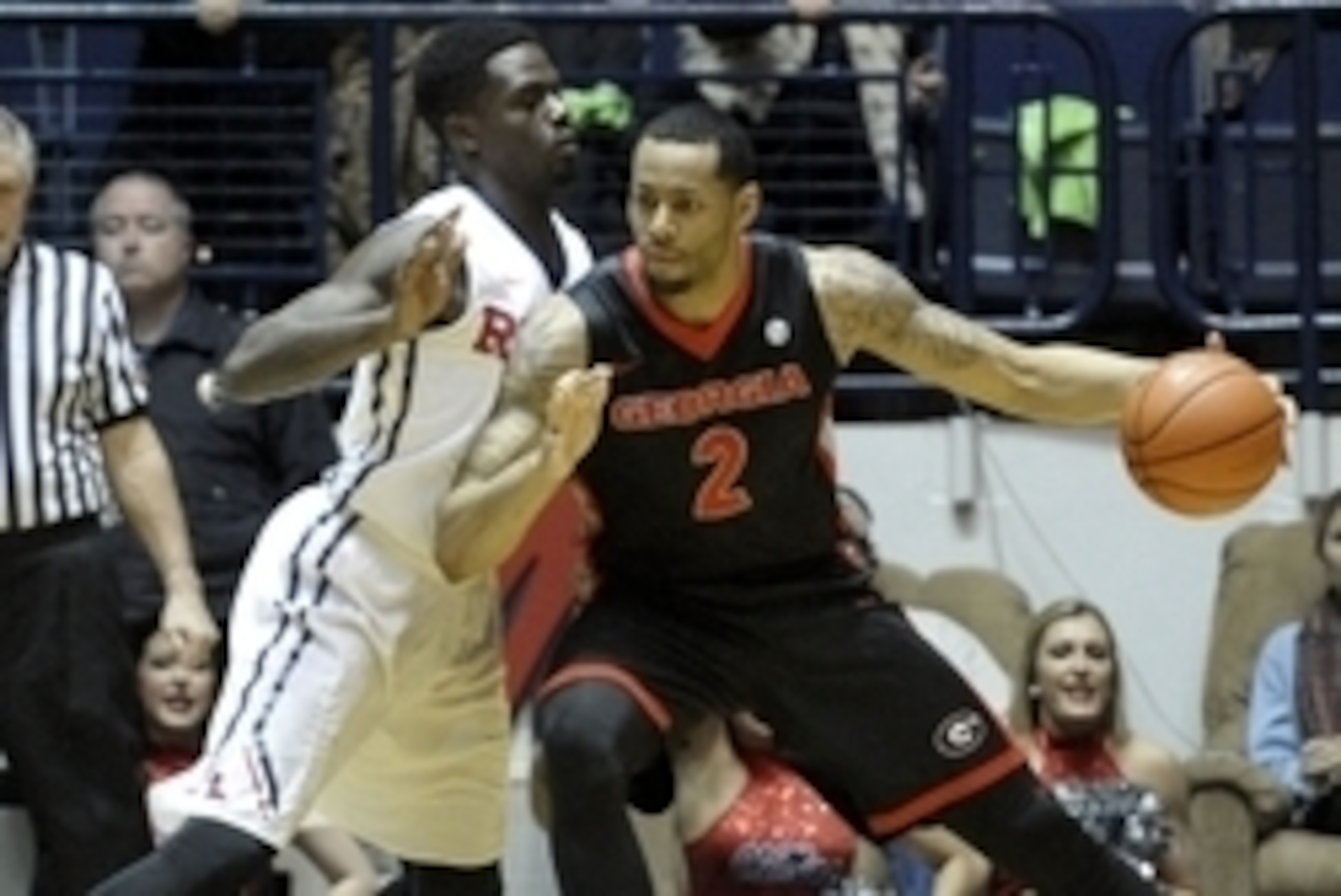 Feb 25, 2015; Oxford, MS, USA; Georgia Bulldogs forward Marcus Thornton (2) handles the ball against Mississippi Rebels forward M.J. Rhett (4) during the game at C.M Tad Smith Coliseum. Mandatory Credit: Justin Ford-USA TODAY Sports