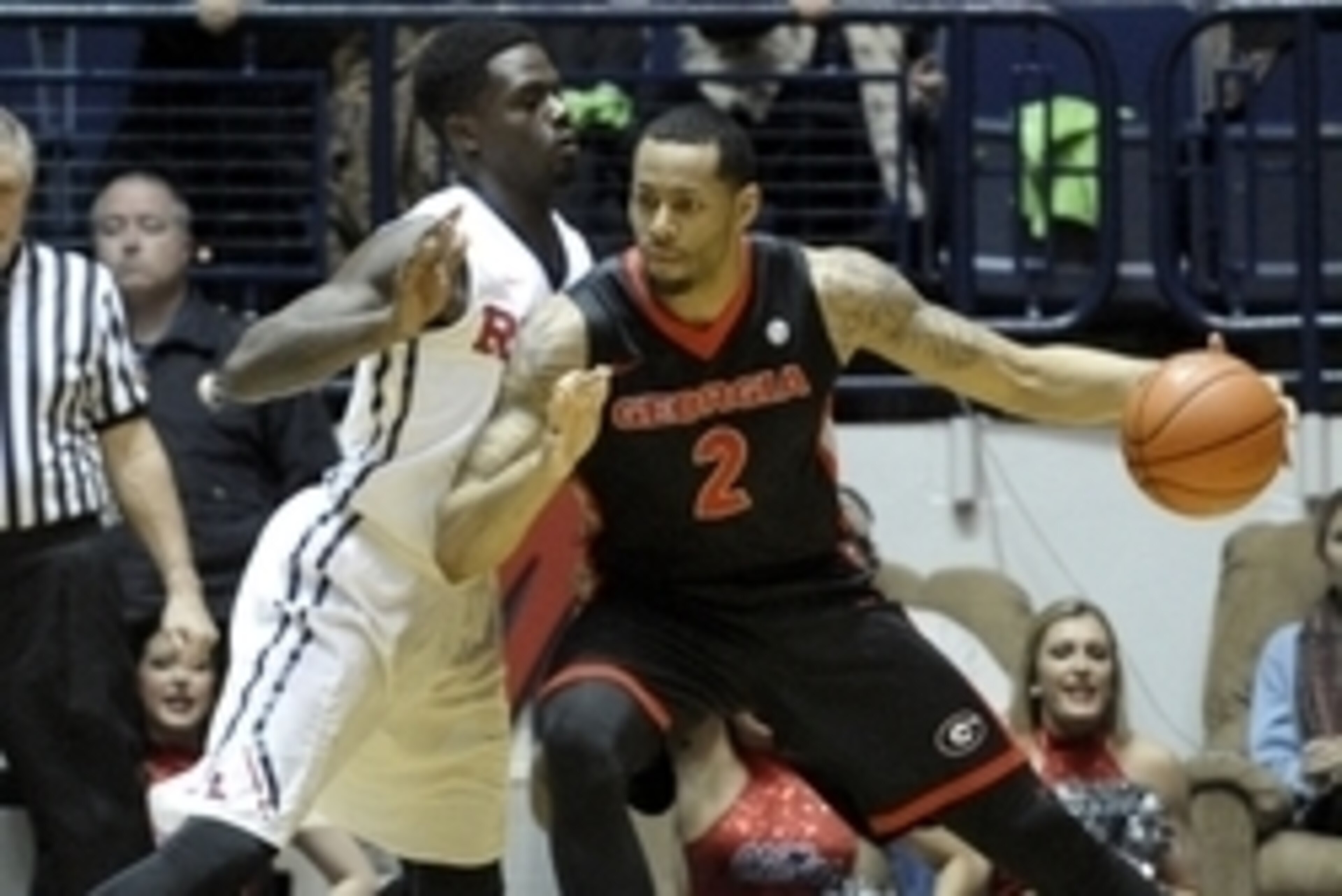 Feb 25, 2015; Oxford, MS, USA; Georgia Bulldogs forward Marcus Thornton (2) handles the ball against Mississippi Rebels forward M.J. Rhett (4) during the game at C.M Tad Smith Coliseum. Mandatory Credit: Justin Ford-USA TODAY Sports Feb 25, 2015; Oxford, MS, USA; Georgia Bulldogs forward Marcus Thornton (2) handles the ball against Mississippi Rebels forward M.J. Rhett (4) during the game at C.M Tad Smith Coliseum. Mandatory Credit: Justin Ford-USA TODAY Sports