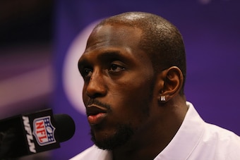 PHOENIX, AZ - JANUARY 27:  Devin McCourty #32 of the New England Patriots addresses the media at Super Bowl XLIX Media Day Fueled by Gatorade inside U.S. Airways Center on January 27, 2015 in Phoenix, Arizona.  (Photo by Elsa/Getty Images)