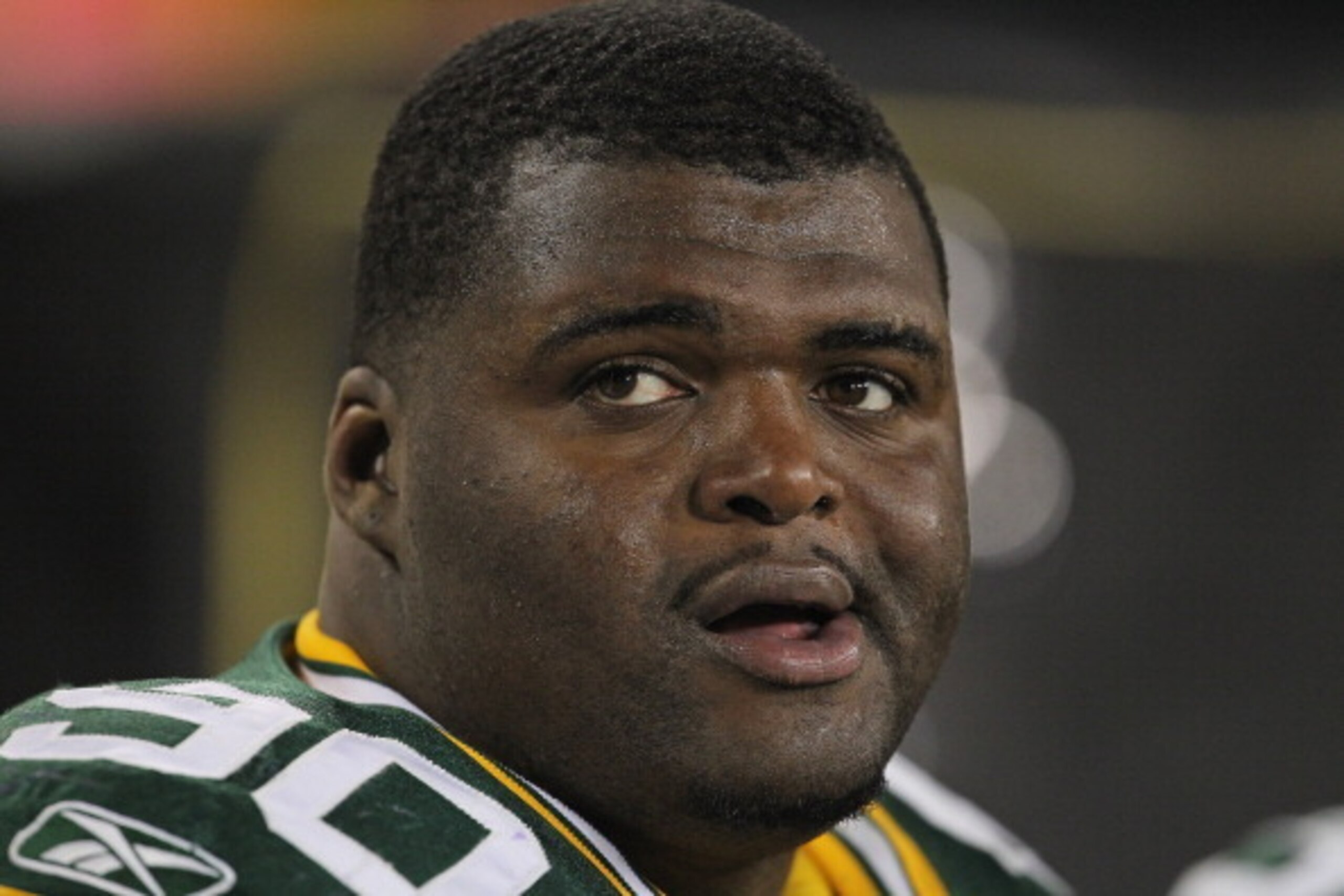 GREEN BAY, WI - NOVEMBER 14: B.J. Raji #90 of the Green Bay Packers rests on the bench during a game against the Minnesota Vikings at Lambeau Field on November 14, 2011 in Green Bay, Wisconsin. The Packers defeated the Vikings 45-7. (Photo by Jonathan Dan