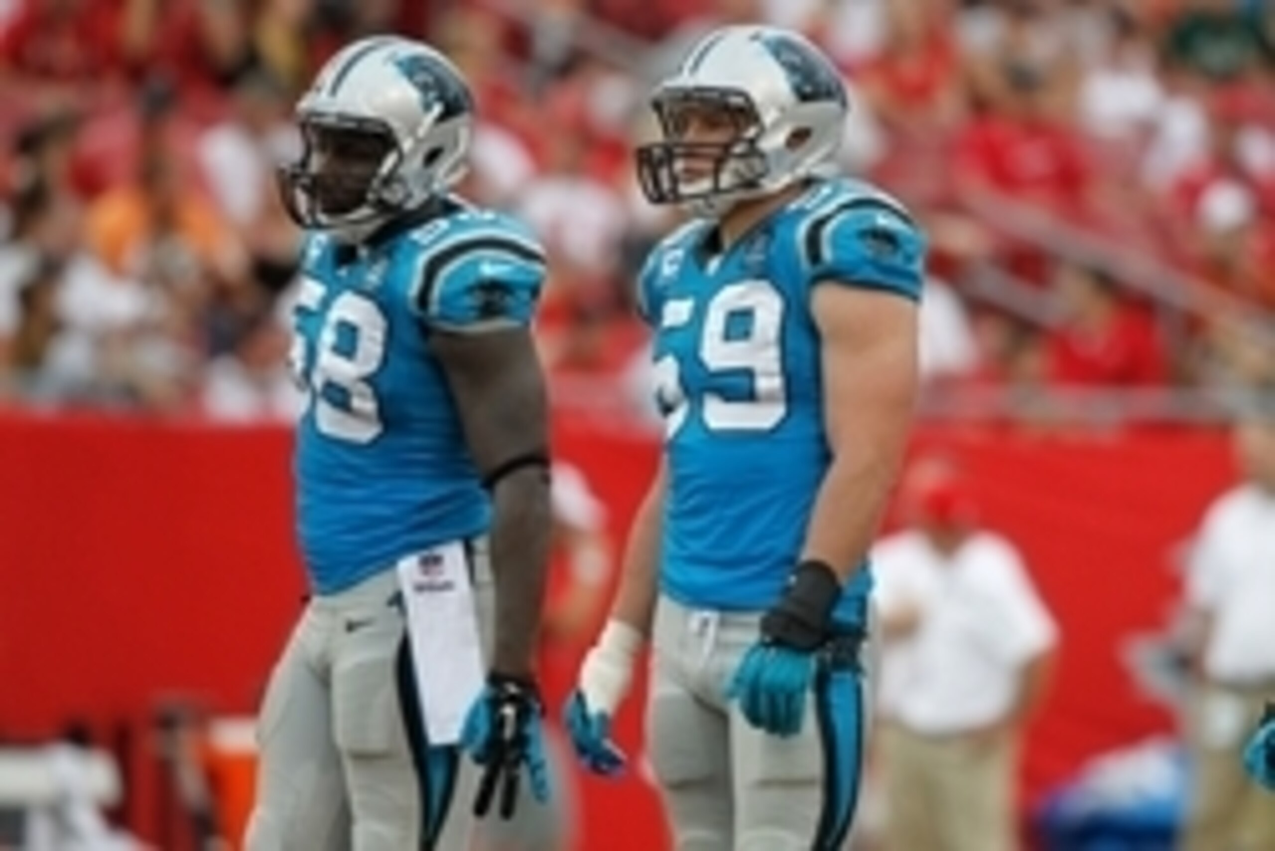 Sep 7, 2014; Tampa, FL, USA; Carolina Panthers middle linebacker Luke Kuechly (59) and outside linebacker Thomas Davis (58) against the Tampa Bay Buccaneers during the second half at Raymond James Stadium. Carolina Panthers defeated the Tampa Bay Buccanee