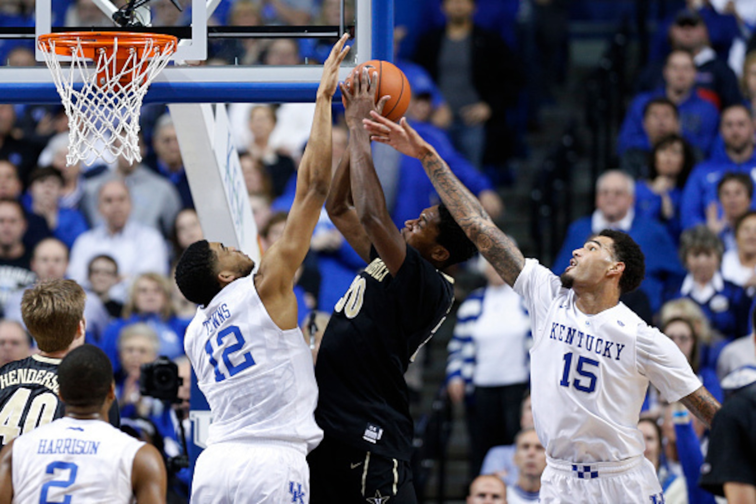 LEXINGTON, KY - JANUARY 20: Karl-Anthony Towns #12 and Willie Cauley-Stein #15 of the Kentucky Wildcats defend against Damian Jones #30 of the Vanderbilt Commodores during the game at Rupp Arena on January 20, 2015 in Lexington, Kentucky. Kentucky defeate