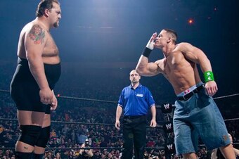 Big Show stares down John Cena.