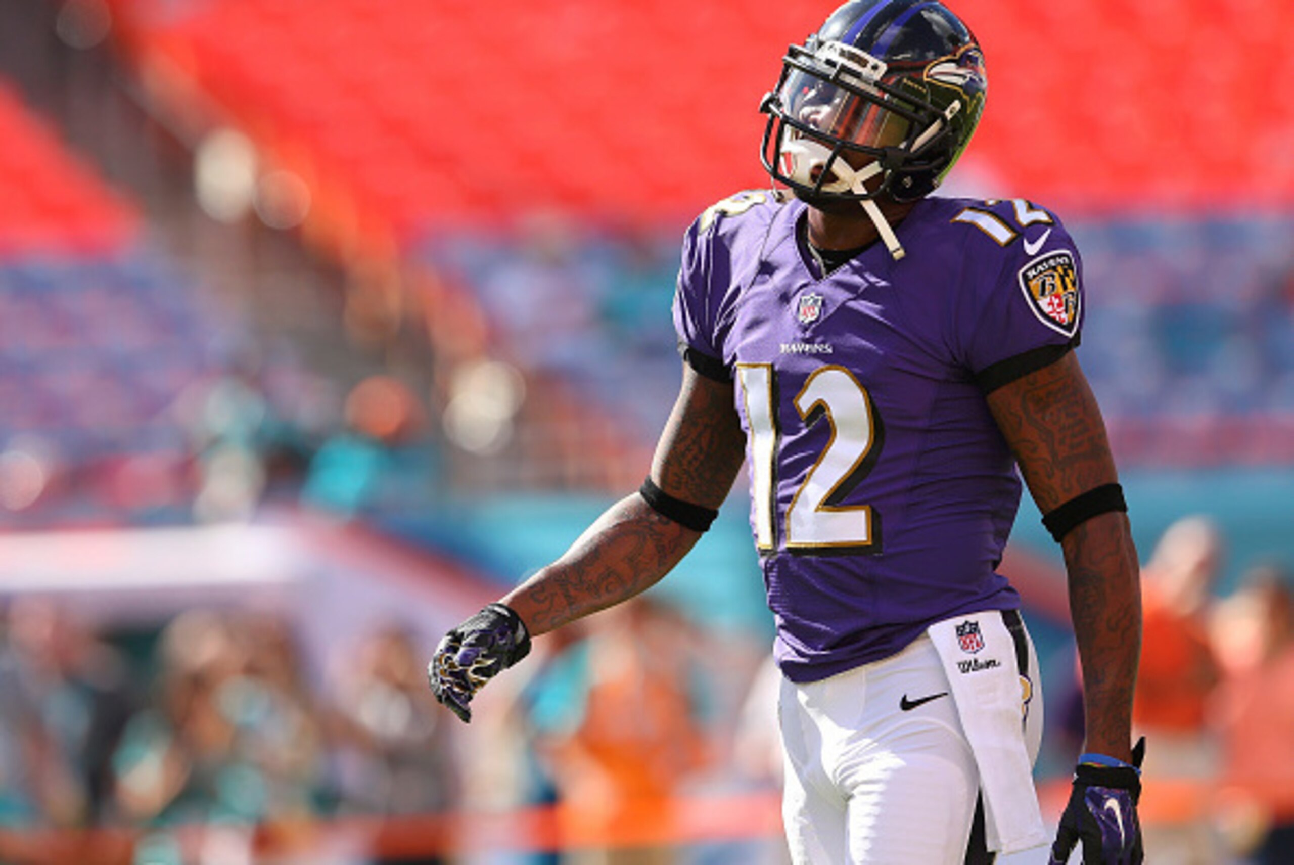 MIAMI GARDENS, FL - DECEMBER 07: Wide receiver Jacoby Jones #12 of the Baltimore Ravens takes part in drills before the Ravens met the Miami Dolphins in a game at Sun Life Stadium on December 7, 2014 in Miami Gardens, Florida.  (Photo by Mike Ehrmann/Gett