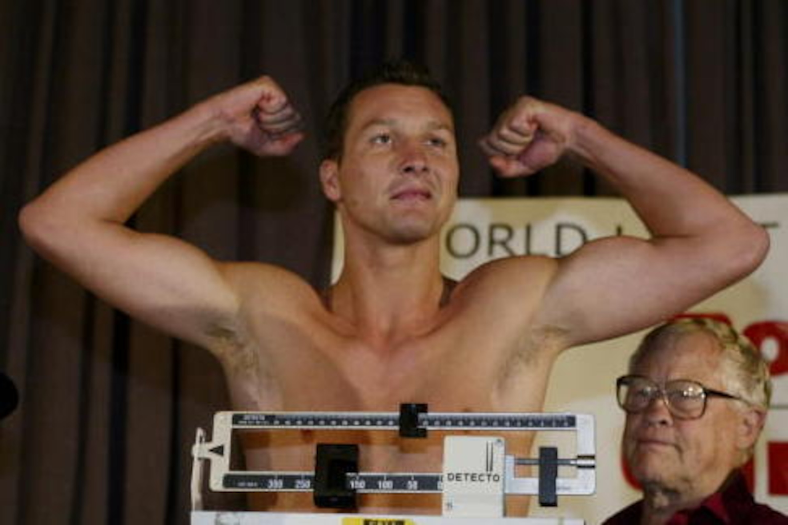 PORTLAND, OR - SEPTEMBER 6:  Challenger Clinton Woods weighs in at 174 pounds at the Benson Hotel the day before his Light Heavywight Championship fight against champion Roy Jones Jr. on September 6, 2002 in Portland, Oregon.  (Photo by Jed Jacobsohn/Gett