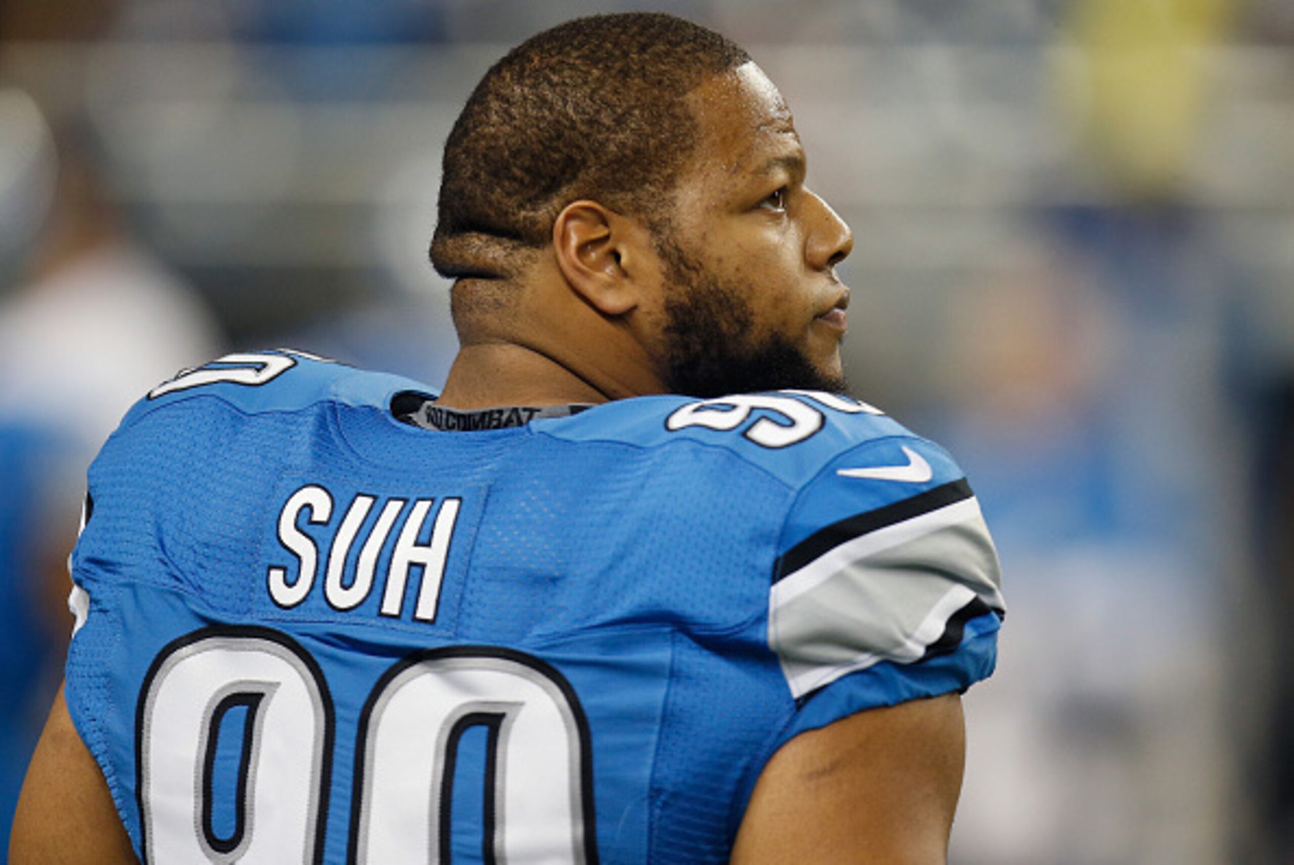 DETROIT, MI - DECEMBER 14: Ndamukong Suh #90 of the Detroit Lions participates in pre game warm ups prior to the game against the Minnesota Vikings at Ford Field on December 14, 2014 in Detroit, Michigan. (Photo by Gregory Shamus/Getty Images)
