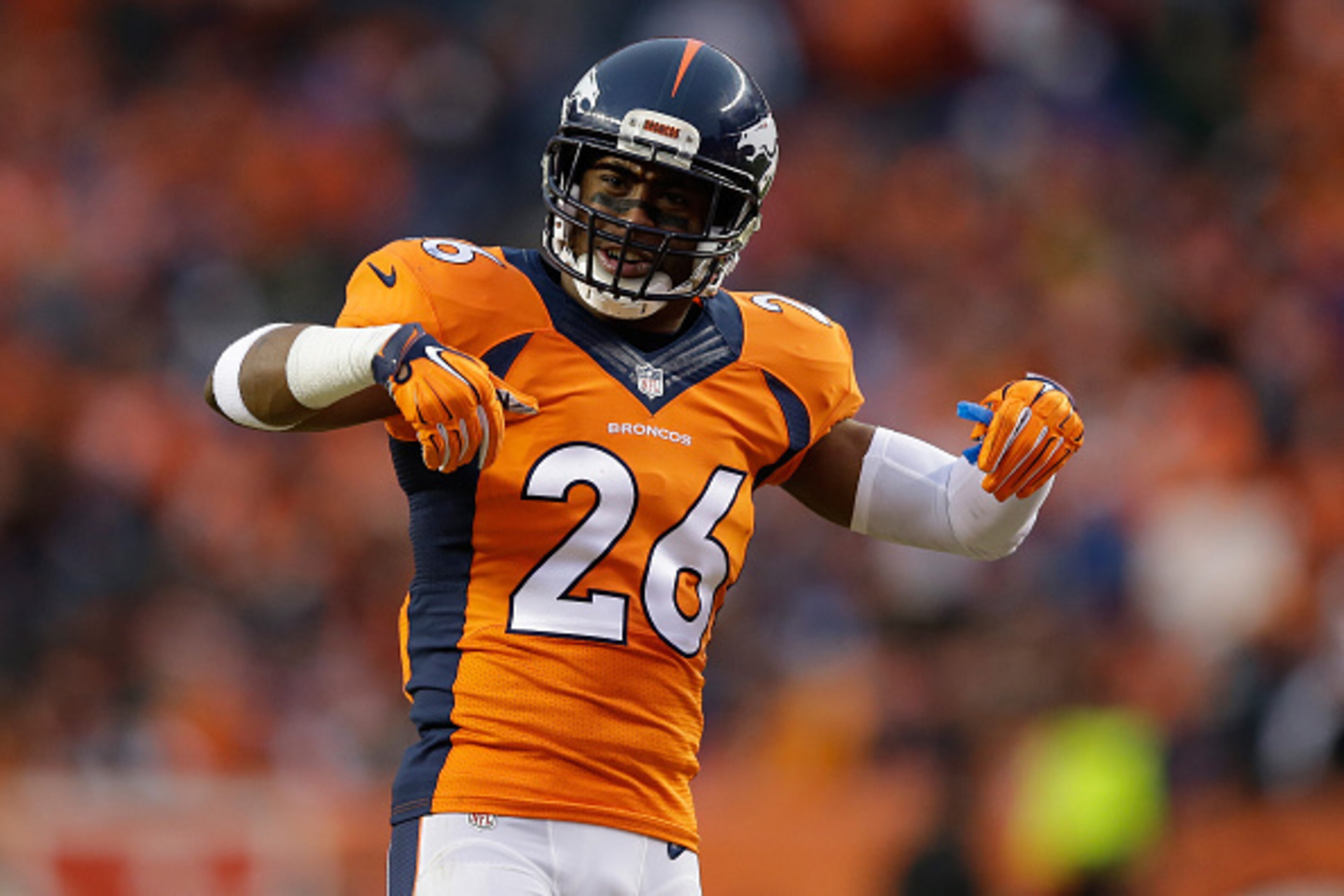 DENVER, CO - JANUARY 11:  Rahim Moore #26 of the Denver Broncos reacts againts the Indianapolis Colts during a 2015 AFC Divisional Playoff game at Sports Authority Field at Mile High on January 11, 2015 in Denver, Colorado.  (Photo by Ezra Shaw/Getty Imag