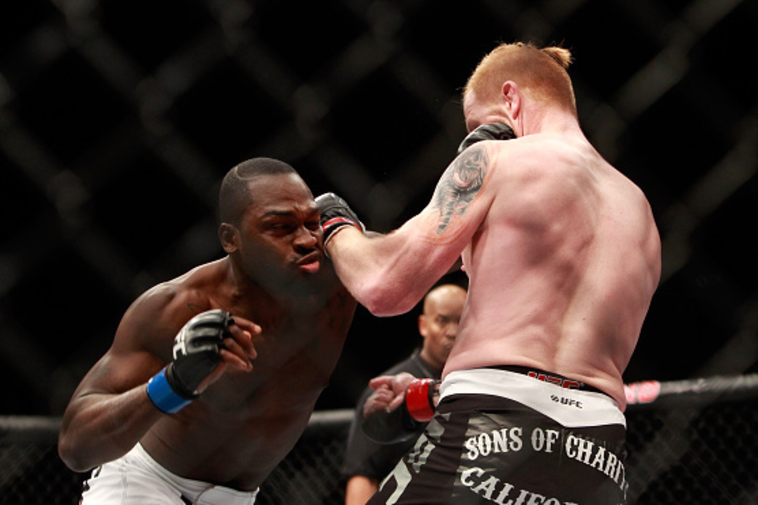 LAS VEGAS, NV - JANUARY 31:  Derek Brunson (L) punches Ed Herman in their middleweight bout during UFC 183 at the MGM Grand Garden Arena on January 31, 2015 in Las Vegas, Nevada. Brunson won with a first-round TKO.  (Photo by Steve Marcus/Getty Images)
