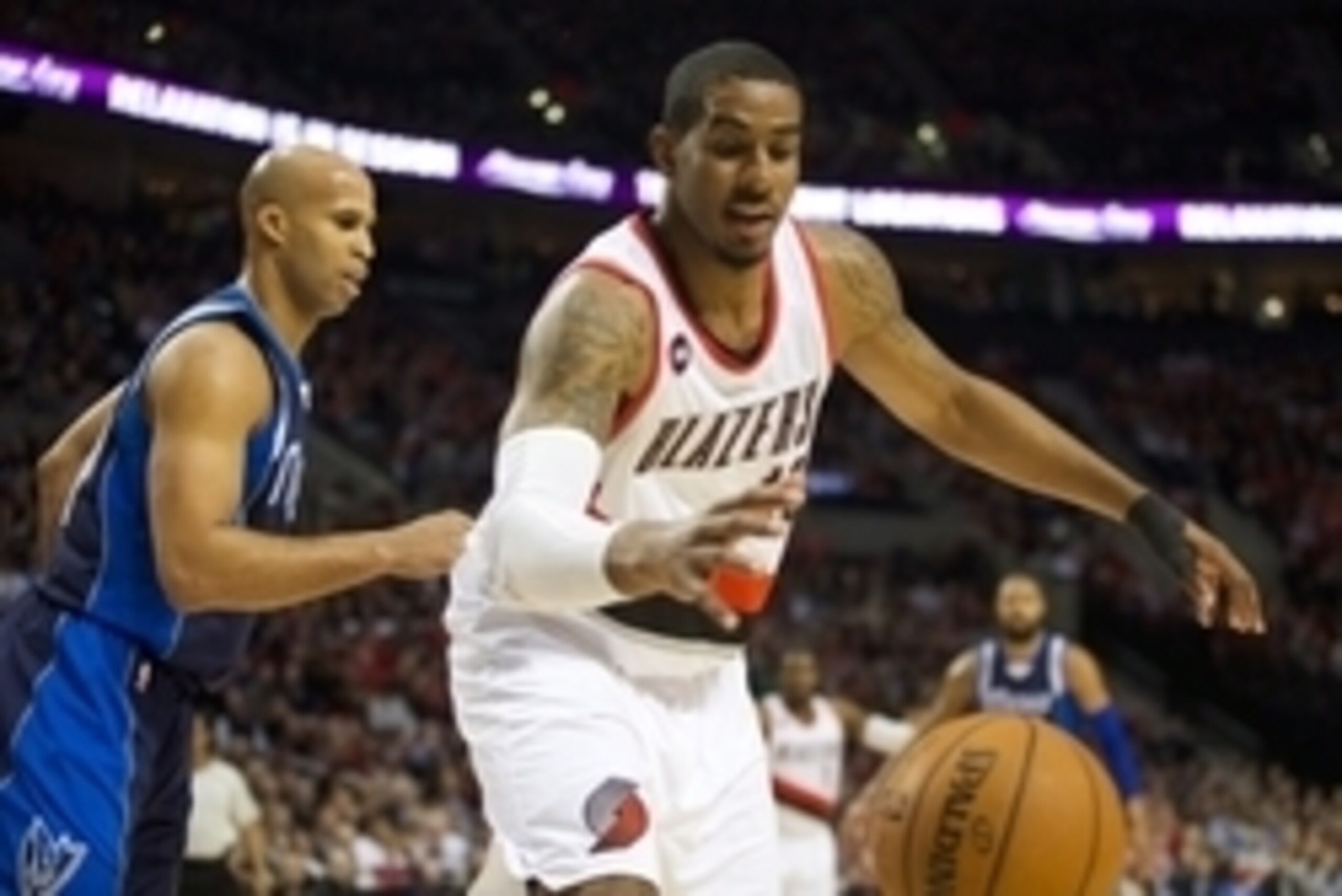 Mar 5, 2015; Portland, OR, USA; Portland Trail Blazers forward LaMarcus Aldridge (12) chases down a loose ball against Dallas Mavericks forward Richard Jefferson (24) at Moda Center at the Rose Quarter. Mandatory Credit: Jaime Valdez-USA TODAY Sports Mar 5, 2015; Portland, OR, USA; Portland Trail Blazers forward LaMarcus Aldridge (12) chases down a loose ball against Dallas Mavericks forward Richard Jefferson (24) at Moda Center at the Rose Quarter. Mandatory Credit: Jaime Valdez-USA TODAY Sports