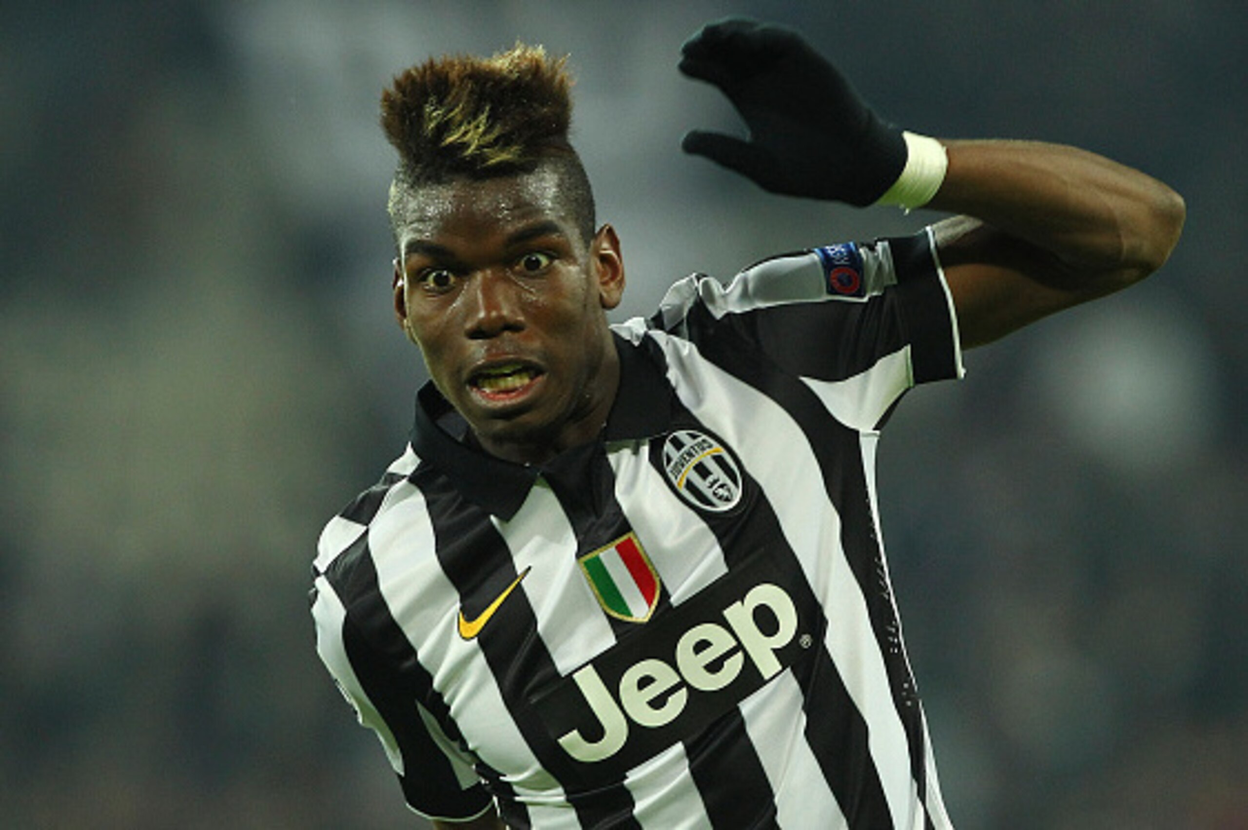 TURIN, ITALY - FEBRUARY 24:  Paul Pogba of Juventus FC in action during the UEFA Champions League Round of 16 match between Juventus and Borussia Dortmund at Juventus Arena on February 24, 2015 in Turin, Italy.  (Photo by Marco Luzzani/Getty Images)