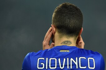 TURIN, ITALY - JANUARY 15:  A tattoo on the neck  of Sebastian Giovinco of Juventus FC during the TIM Cup match between Juventus FC and Hellas Verona FC at Juventus Arena on January 15, 2015 in Turin, Italy.  (Photo by Valerio Pennicino/Getty Images)