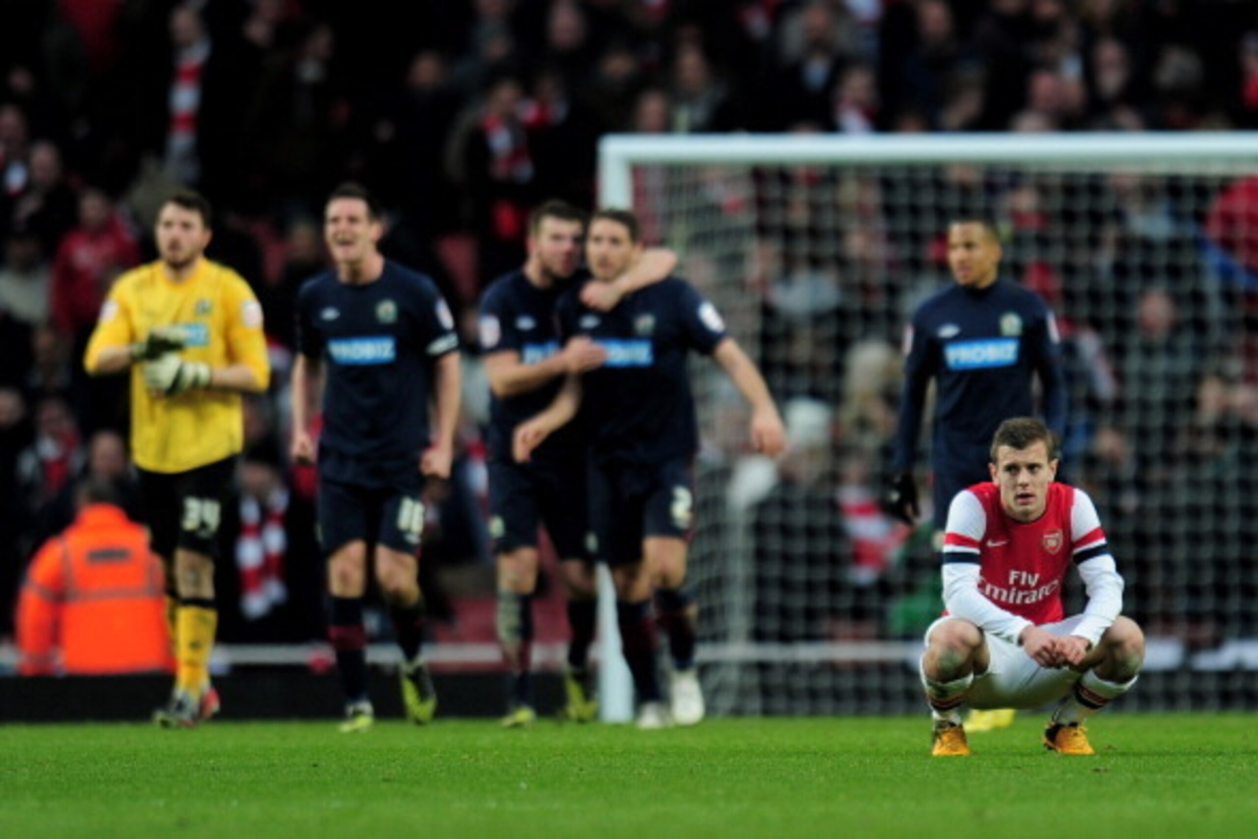 LONDON, ENGLAND - FEBRUARY 16:  A dejected Jack Wilshere of Arsenal looks on following his team's 1-0 defeat  during the FA Cup with Budweiser fifth round match between Arsenal and Blackburn Rovers at Emirates Stadium on February 16, 2013 in London, Engla