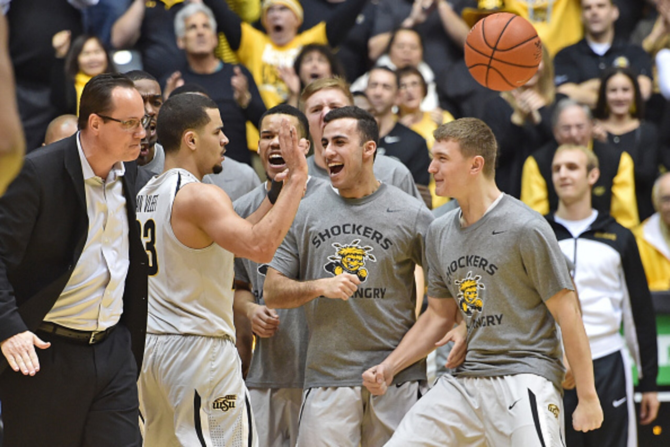 WICHITA, KS - FEBRUARY 28:  Guard Fred Van Vleet #23 of the Wichita State Shockers celebrates with teammates after a scoring run against the Northern Iowa Panthers during the first half on February 28, 2015 at Charles Koch Arena in Wichita, Kansas.  (Phot