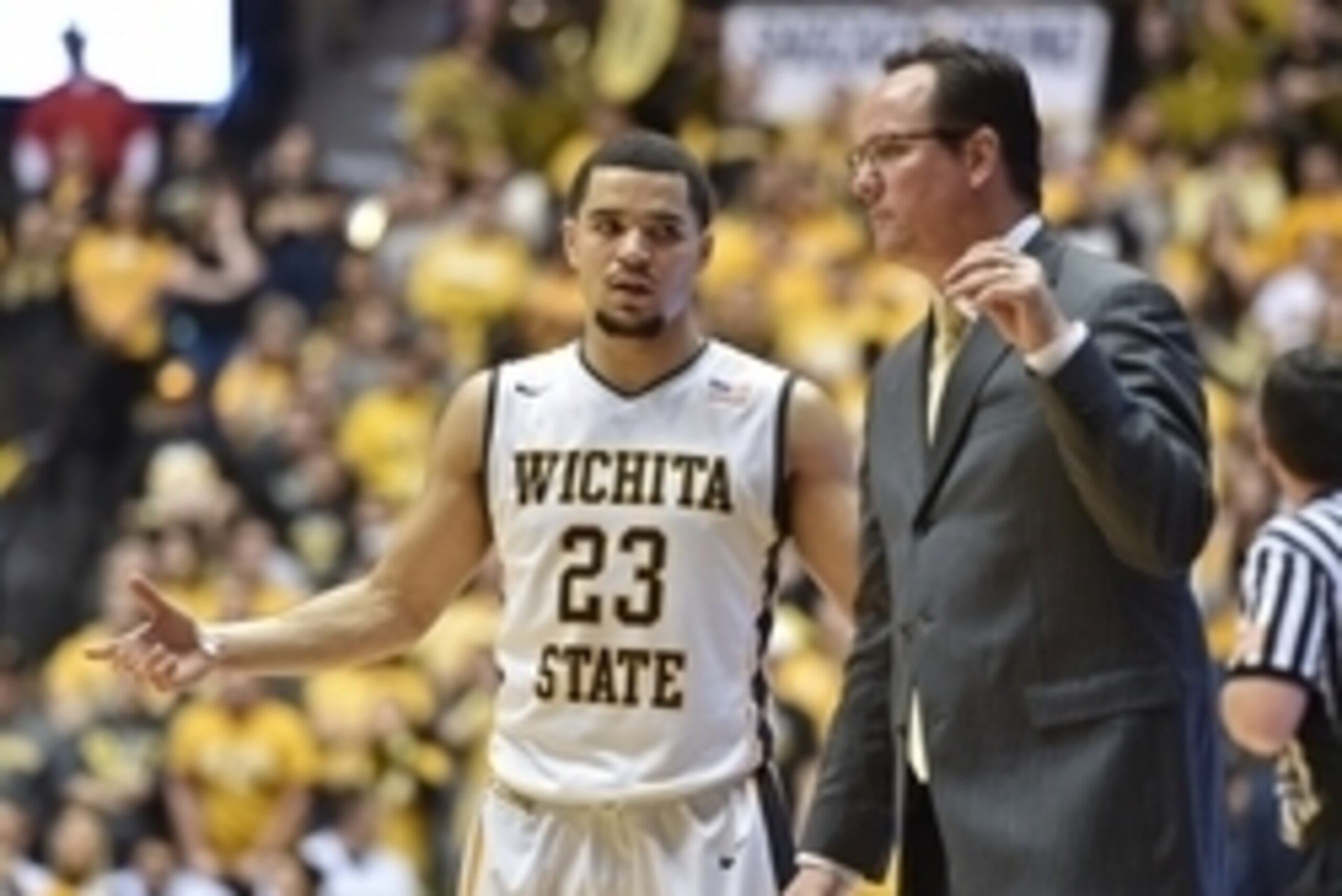 Dec 16, 2014; Wichita, KS, USA; Wichita State Shockers guard Fred Van Vleet (23) talks with head coach Gregg Marshall (right) against the Alabama Crimson Tide during the second half at Charles Koch Arena. Wichita State won 53-52. Mandatory Credit: Peter G