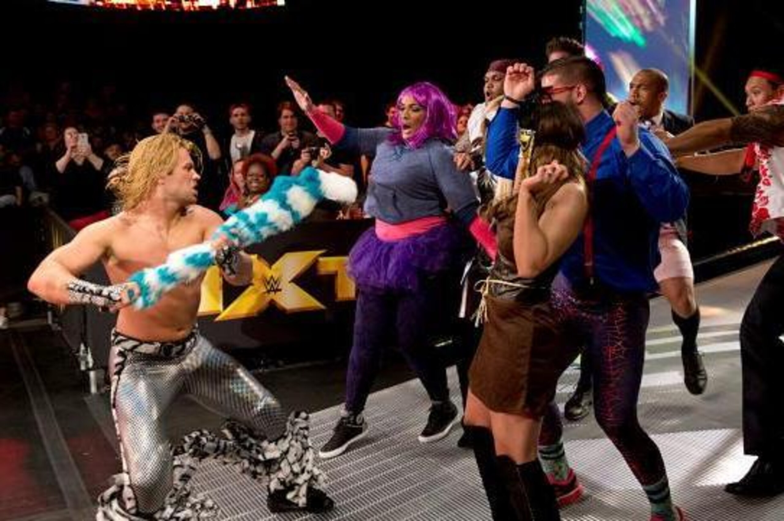 Tyler Breeze charges at the Rosebuds.