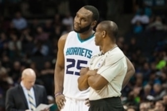 Mar 6, 2015; Charlotte, NC, USA; Charlotte Hornets center Al Jefferson (25) talks with a referee during the first half against the Toronto Raptors at Time Warner Cable Arena. Mandatory Credit: Jeremy Brevard-USA TODAY Sports