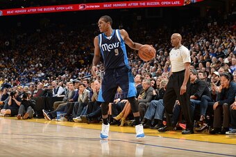 OAKLAND, CA - MARCH 6:  Rajon Rondo #9 of the Dallas Mavericks handles the ball against the Golden State Warriors on March 6, 2015 at ORACLE Arena in Oakland, California. NOTE TO USER: User expressly acknowledges and agrees that, by downloading and or usi