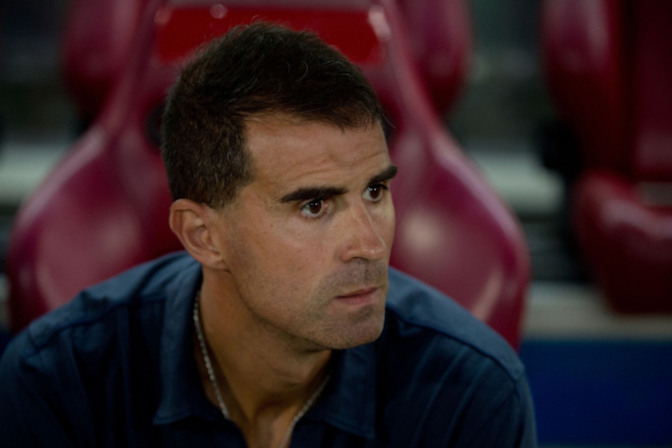 MADRID, SPAIN - AUGUST 30:  Head coach Gaizka Garitano of SD Eibar looks on sitted on the bench prior to start the La Liga match between Club Atletico de Madrid and SD Eibar at Vicente Calderon Stadium on August 30, 2014 in Madrid, Spain.  (Photo by Gonza