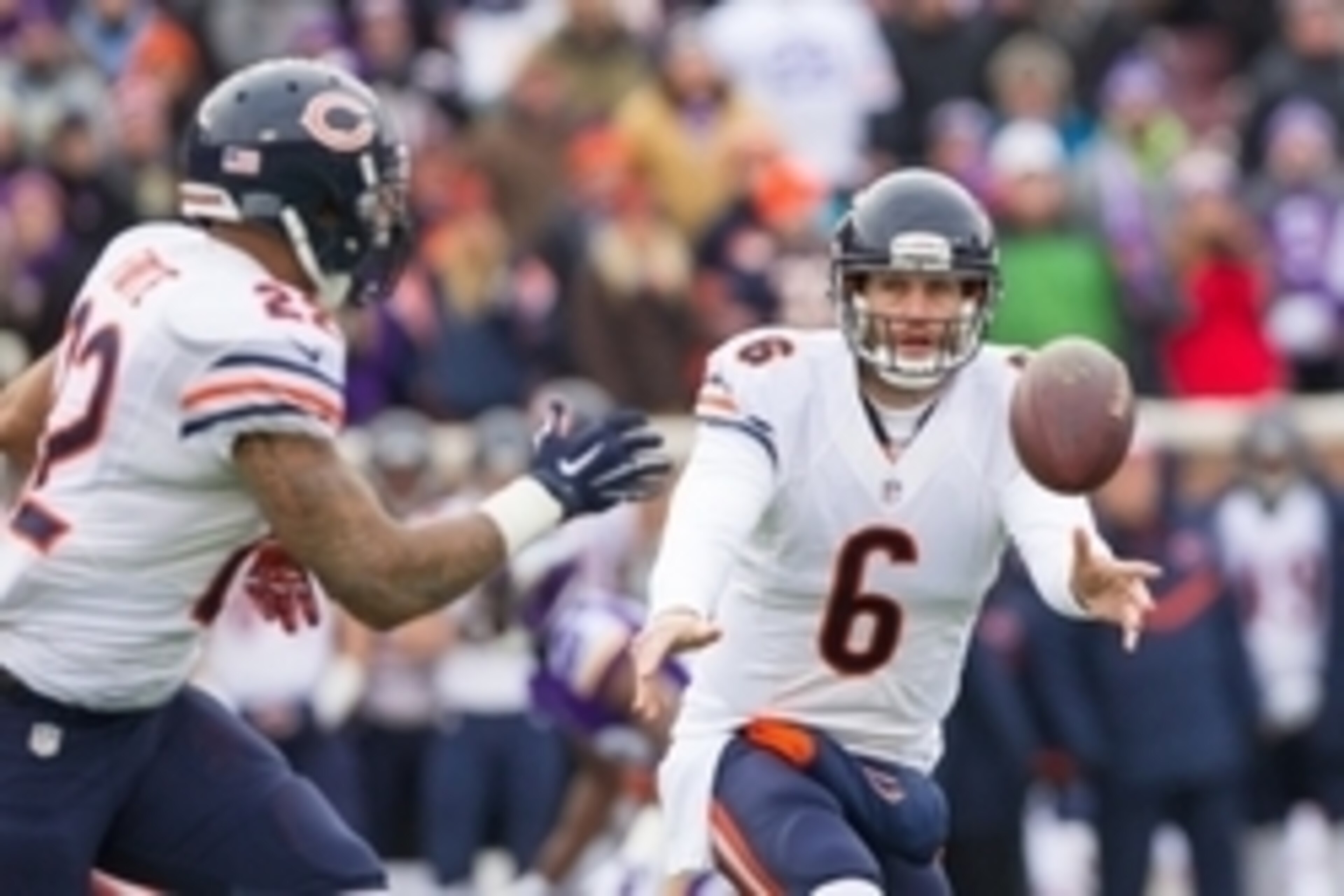 Dec 28, 2014; Minneapolis, MN, USA; Chicago Bears quarterback Jay Cutler (6) pitches the ball to Chicago Bears running back Matt Forte (22) in the first quarter against the Minnesota Vikings at TCF Bank Stadium. Mandatory Credit: Brad Rempel-USA TODAY Spo
