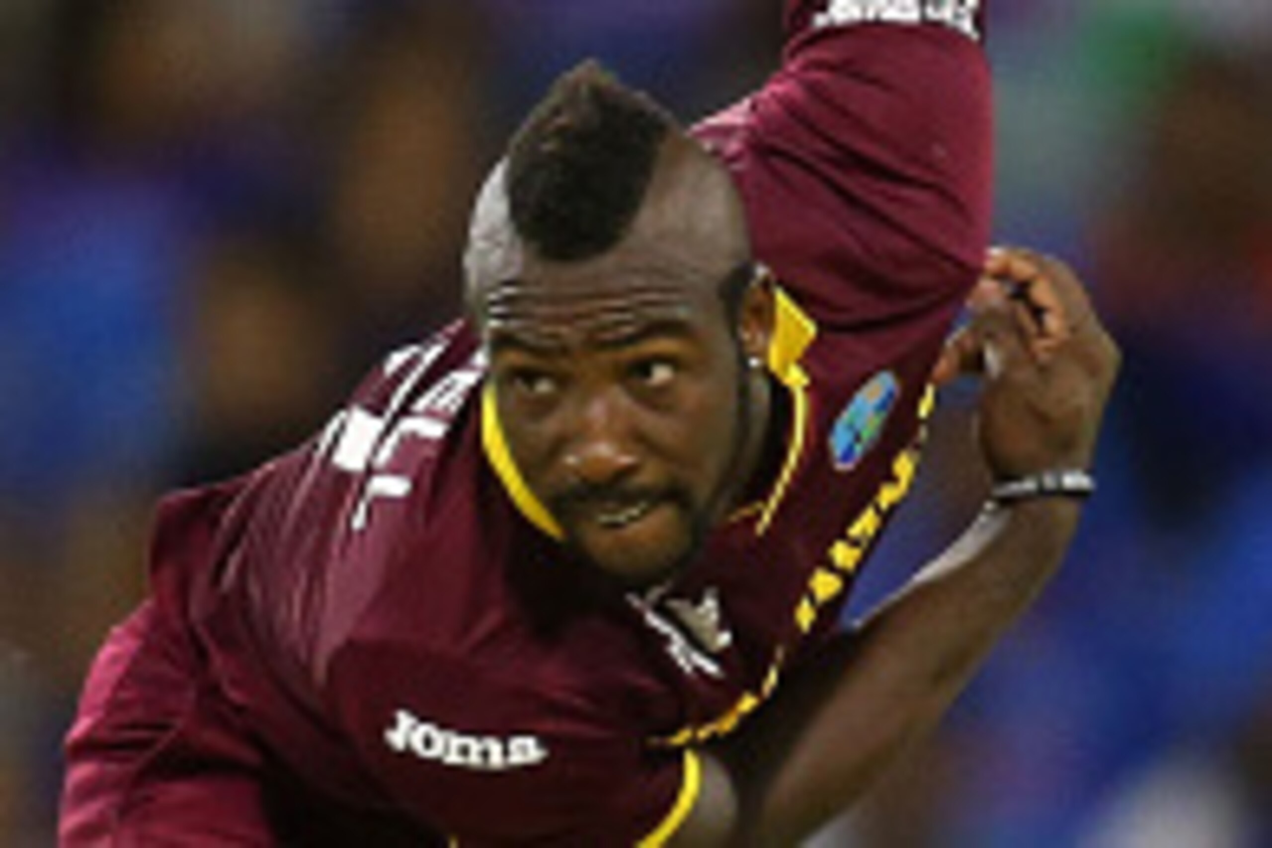 PERTH, AUSTRALIA - MARCH 06:  Andre Russell of the West Indies bowls during the 2015 ICC Cricket World Cup match between India and the West Indies at WACA on March 6, 2015 in Perth, Australia.  (Photo by Paul Kane/Getty Images)