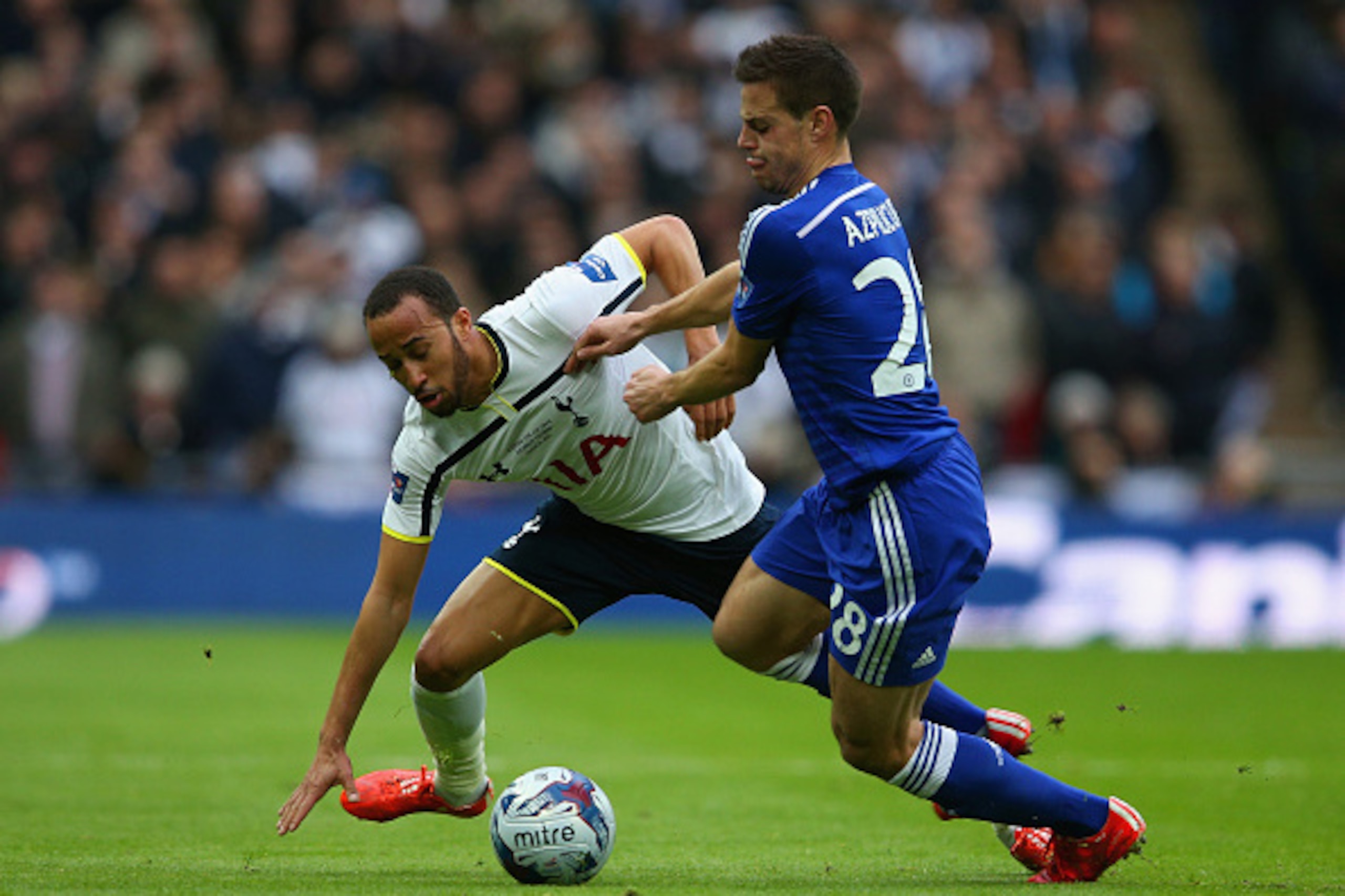 LONDON, ENGLAND - MARCH 01:  Andros Townsend of Spurs and Cesar Azpilicueta of Chelsea battle for the ball during the Capital One Cup Final match between Chelsea and Tottenham Hotspur at Wembley Stadium on March 1, 2015 in London, England.  (Photo by Cliv