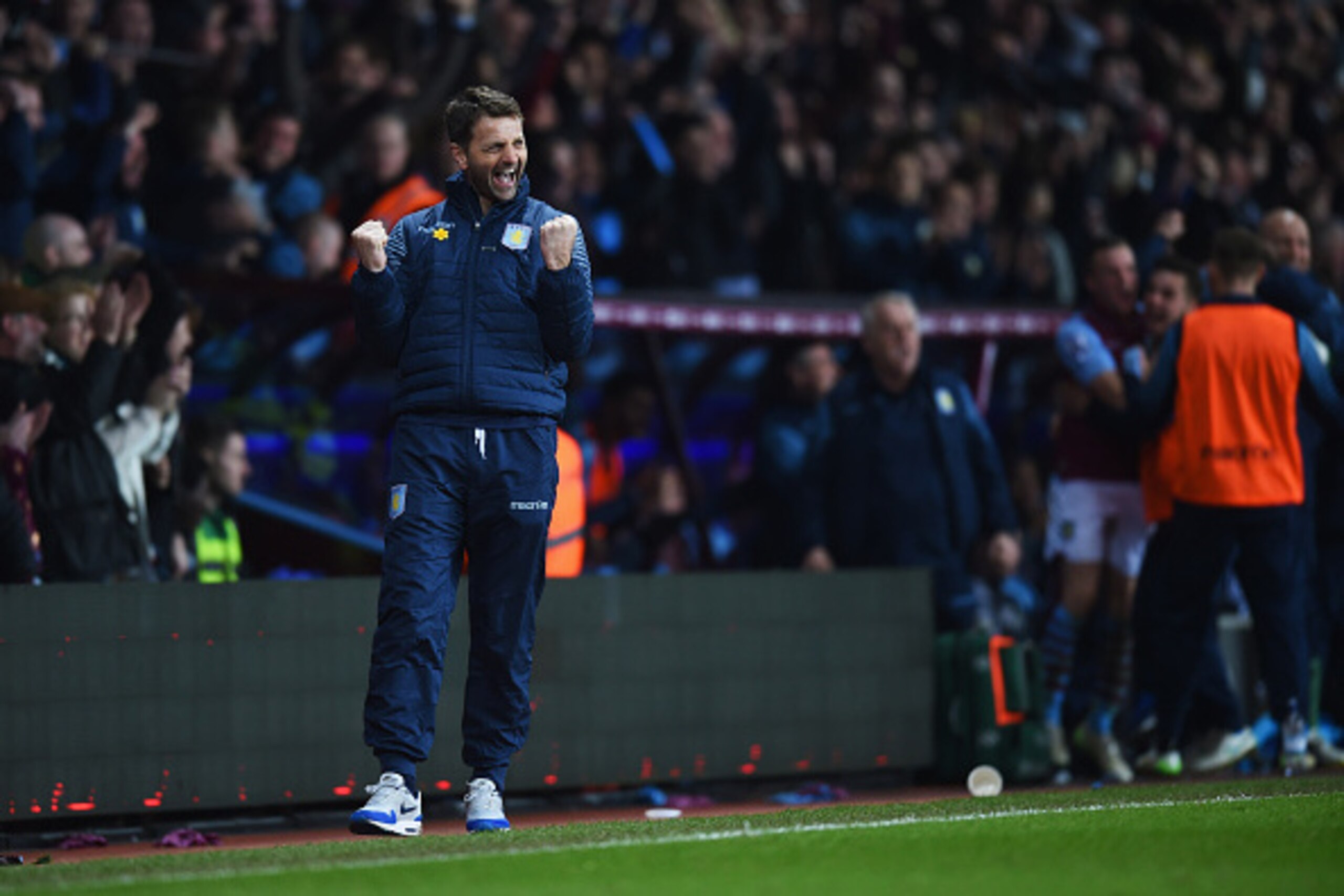BIRMINGHAM, ENGLAND - MARCH 07:  Tim Sherwood manager of Aston Villa and the team bench celebrate as Scott Sinclair of Aston Villa scores their second goal during the FA Cup Quarter Final match between Aston Villa and West Bromwich Albion at Villa Park on