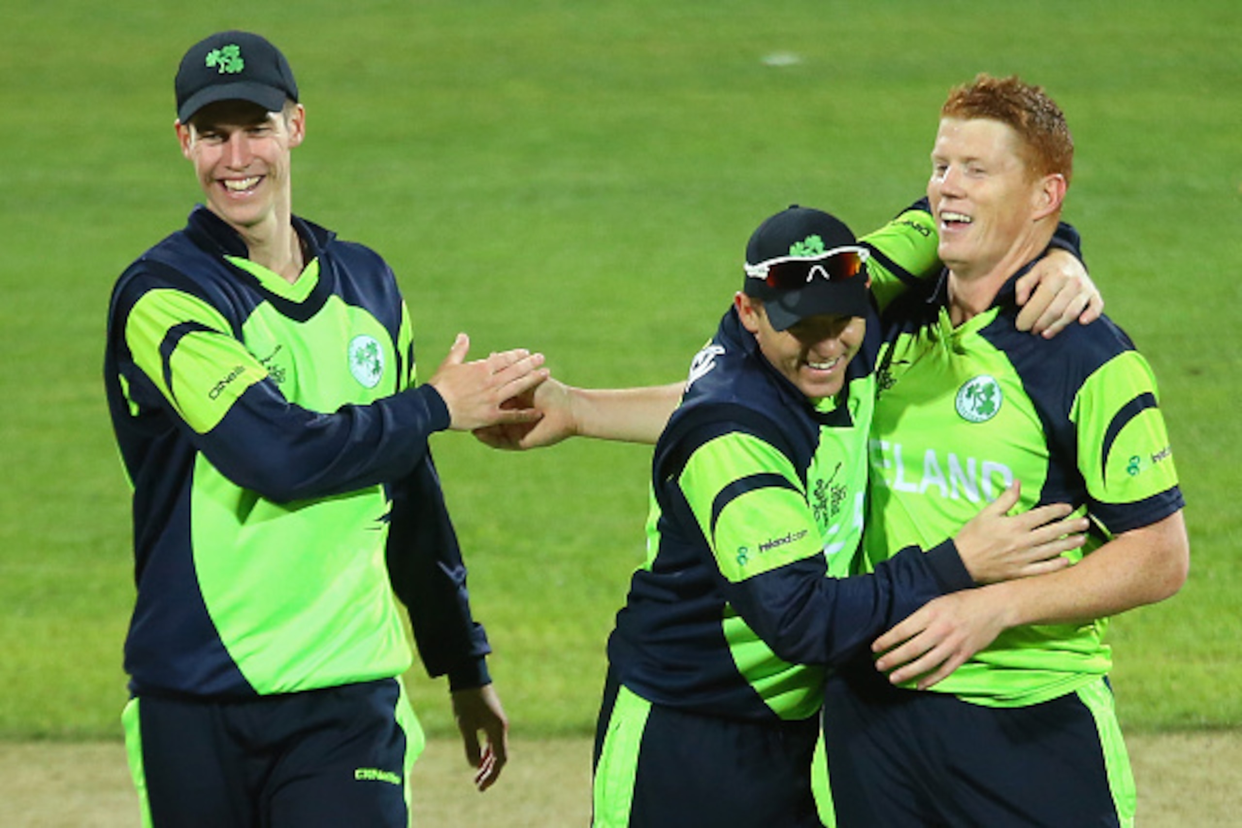 HOBART, AUSTRALIA - MARCH 07:  Kevin O'Brien of Ireland is congratulated by team mates after getting the wicket of Sean Williams of Zimbabwe during the 2015 ICC Cricket World Cup match between Zimbabwe and Ireland at Bellerive Oval on March 7, 2015 in Hob