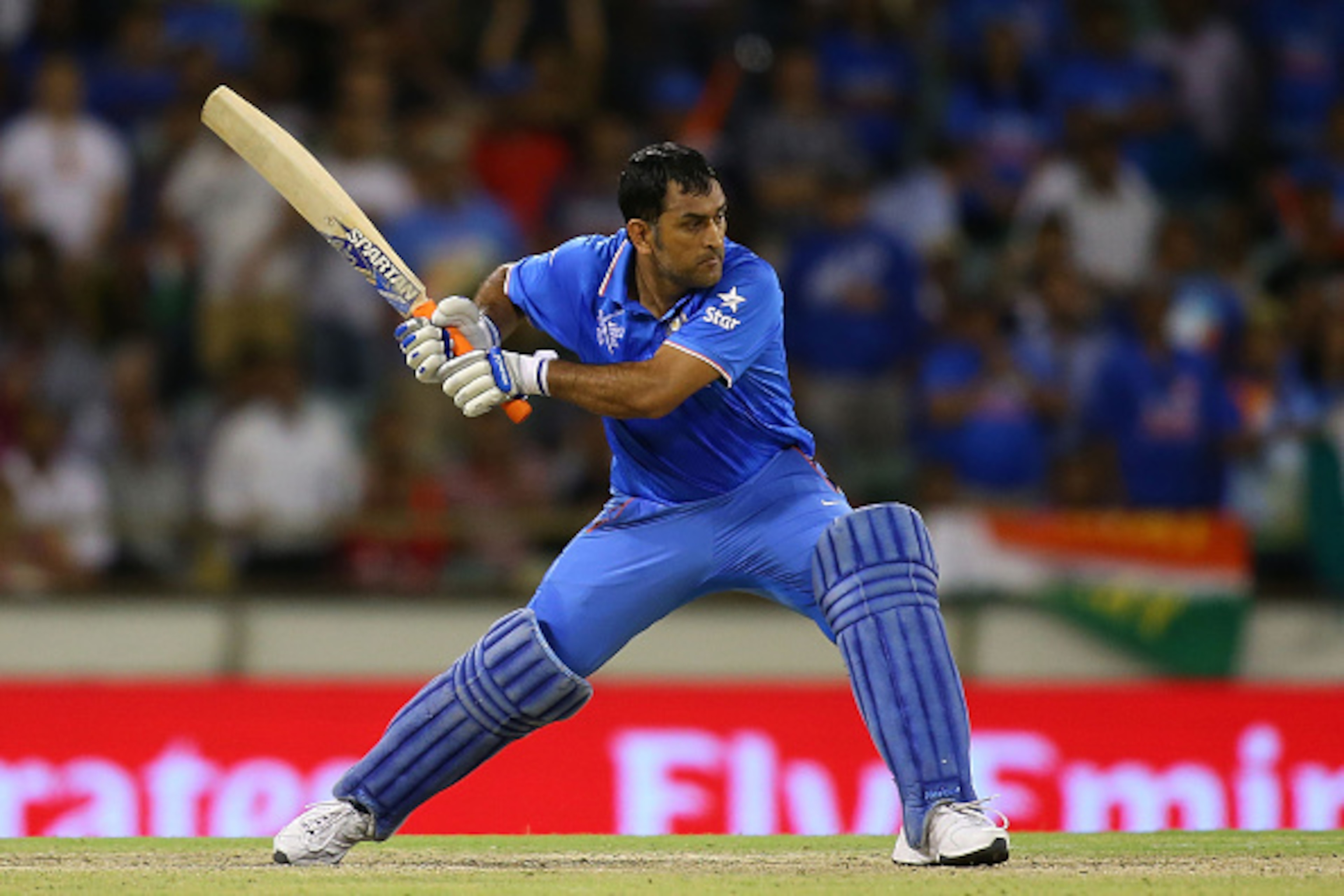 PERTH, AUSTRALIA - MARCH 06: MS Dhoni of India bats during the 2015 ICC Cricket World Cup match between India and the West Indies at WACA on March 6, 2015 in Perth, Australia.  (Photo by Paul Kane/Getty Images)