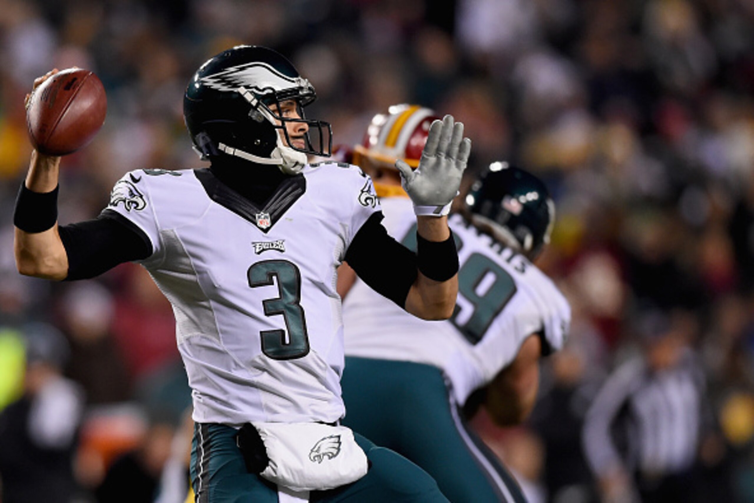 LANDOVER, MD - DECEMBER 20:  Quarterback Mark Sanchez #3 of the Philadelphia Eagles drops back to pass in the second quarter of a game against the Washington Redskins at FedExField on December 20, 2014 in Landover, Maryland.  (Photo by Patrick Smith/Getty