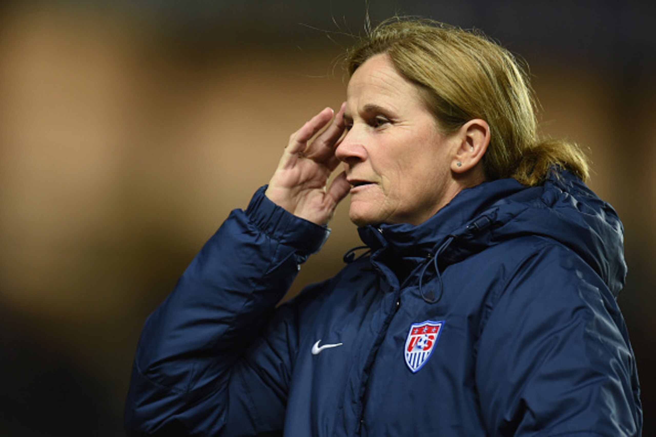 MILTON KEYNES, ENGLAND - FEBRUARY 13:  Jill Ellis head coach of the United States looks on prior to the Women's Friendly International match between England and USA at Stadium mk on February 13, 2015 in Milton Keynes, England.  (Photo by Tom Dulat/Getty I