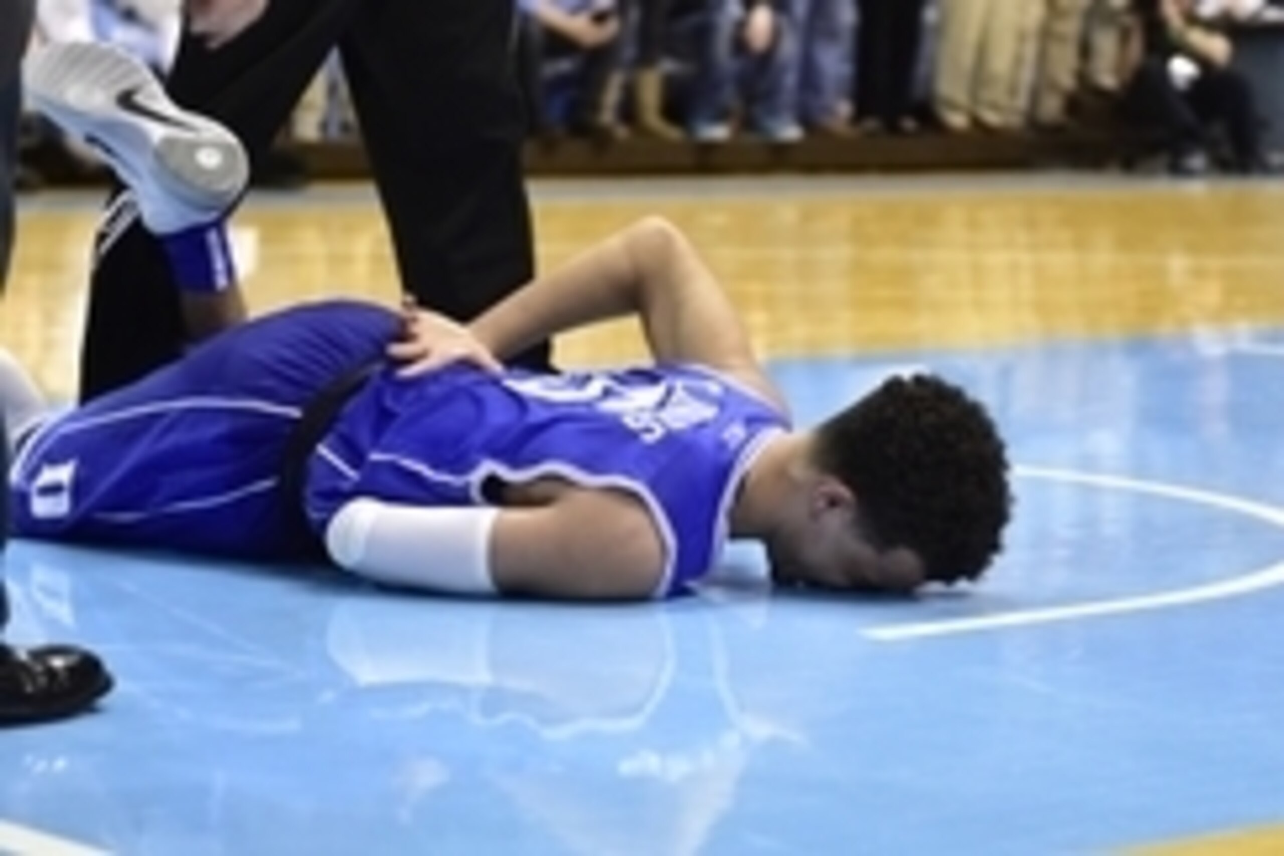 Mar 7, 2015; Chapel Hill, NC, USA; Duke Blue Devils guard Tyus Jones (5) reacts after falling in the second half. The Blue Devils defeated the Tar Heels 84-77 at Dean E. Smith Center. Mandatory Credit: Bob Donnan-USA TODAY Sports
