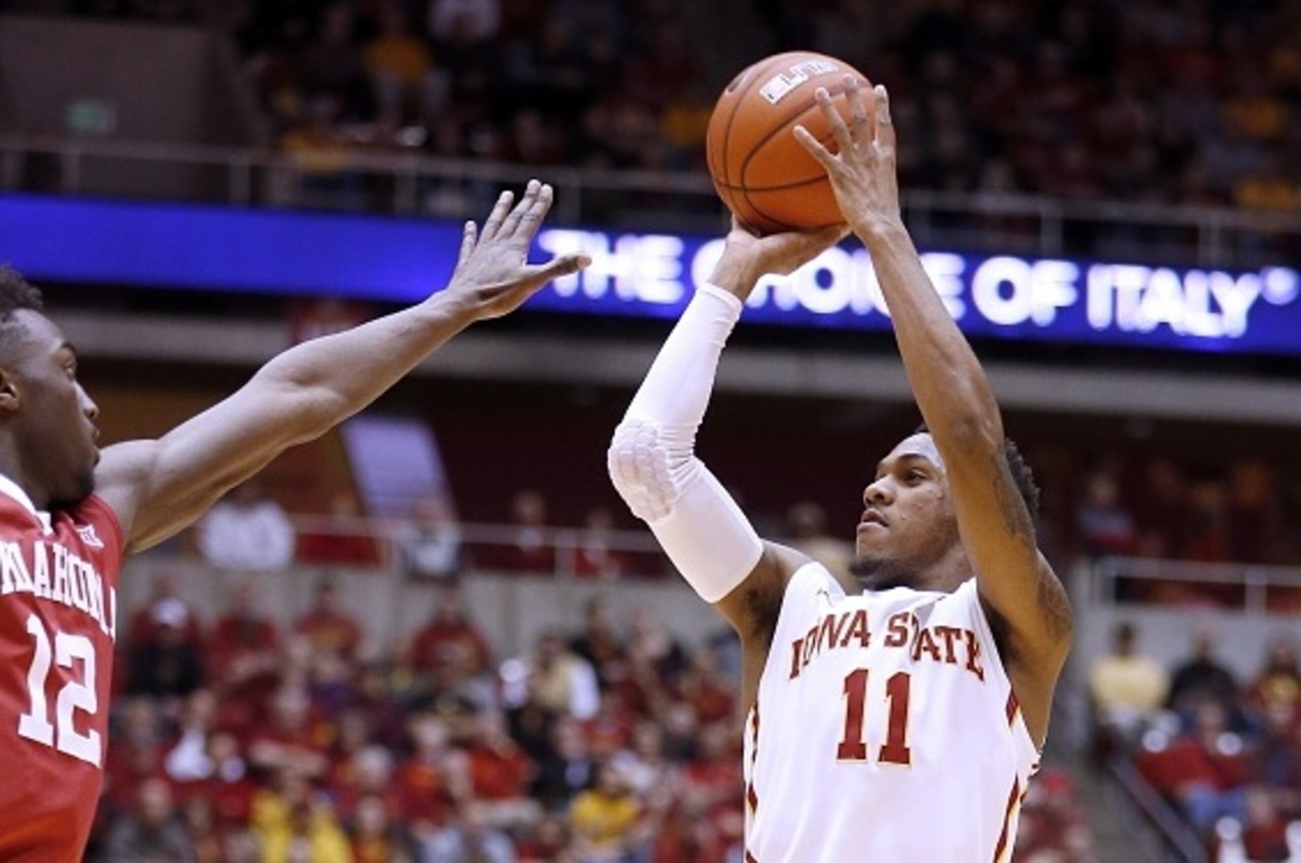 AMES, IA - MARCH 2: Monte Morris #11 of the Iowa State Cyclones takes a shot as Khadeem Lattin #12 of the Oklahoma Sooners blocks in the first half of play at Hilton Coliseum on March 2, 2015 in Ames, Iowa. (Photo by David Purdy/Getty Images)