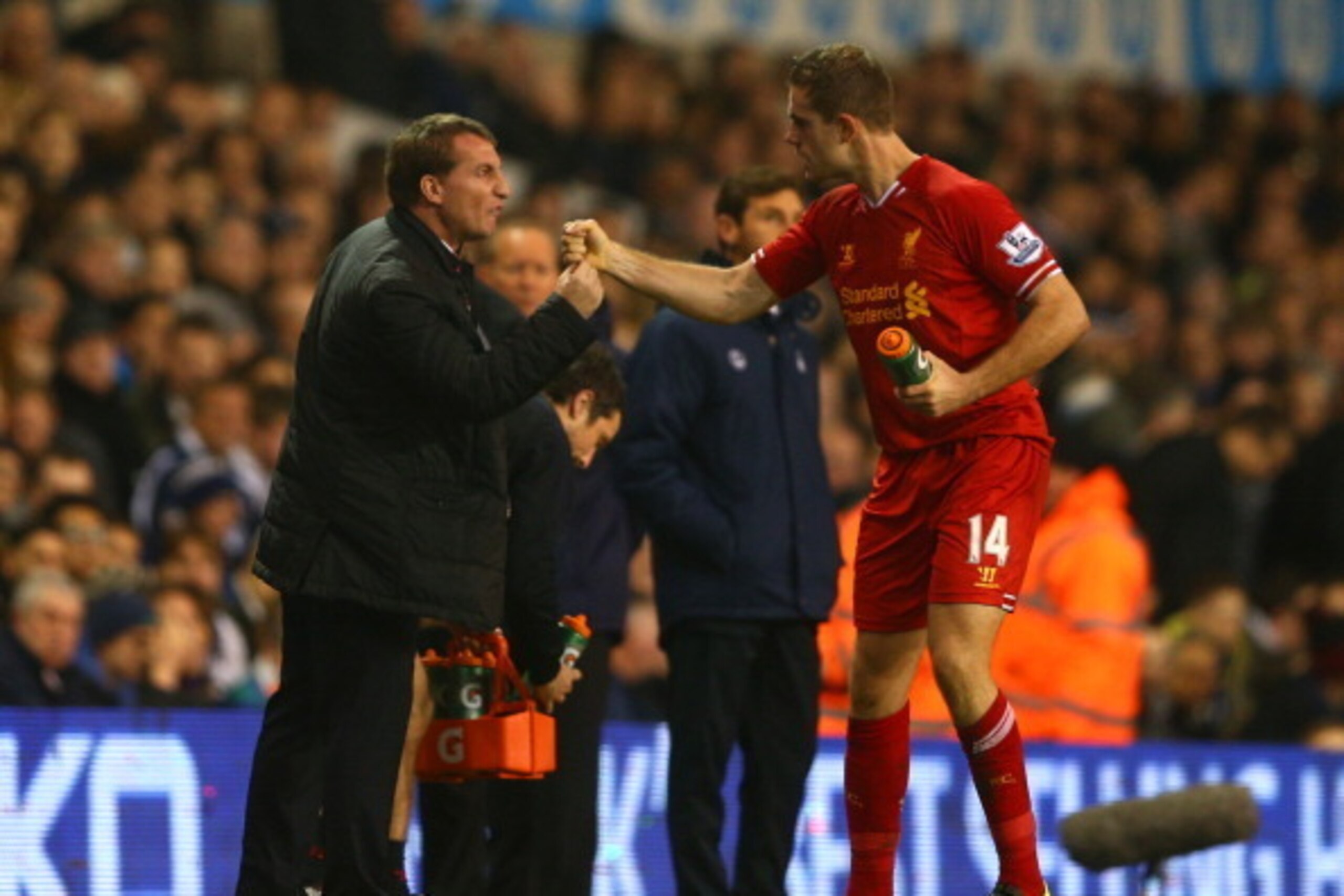 LONDON, ENGLAND - DECEMBER 15:  Manager Brendan Rodgers of Liverpool congratulates Jordan Henderson of Liverpool on scoring their second goal during the Barclays Premier League match between Tottenham Hotspur and Liverpool at White Hart Lane on December 1