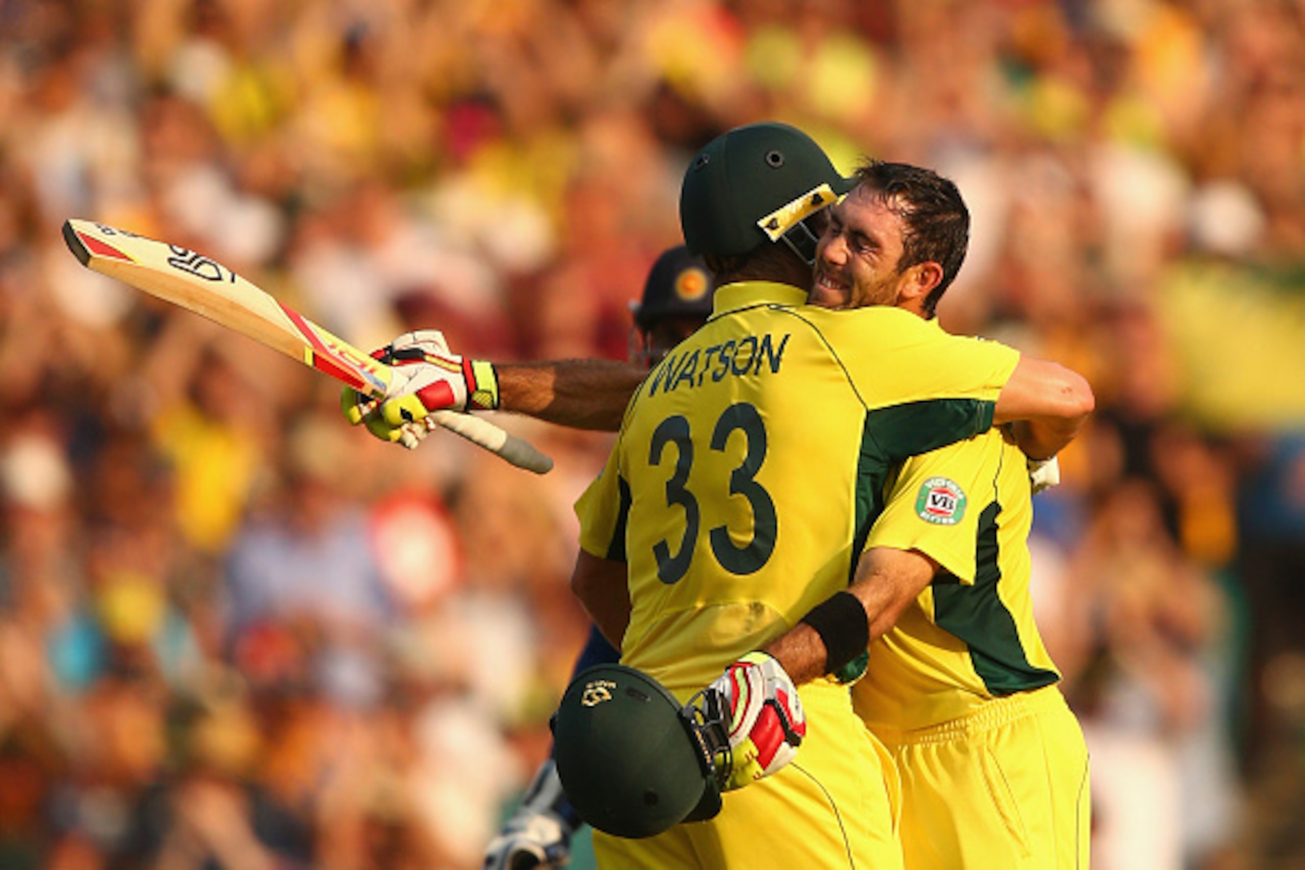 SYDNEY, AUSTRALIA - MARCH 08:  Glenn Maxwell of Australia is congratulated by Shane Watson of Australia after reaaching his century during the 2015 ICC Cricket World Cup match between Australia and Sri Lanka at Sydney Cricket Ground on March 8, 2015 in Sy