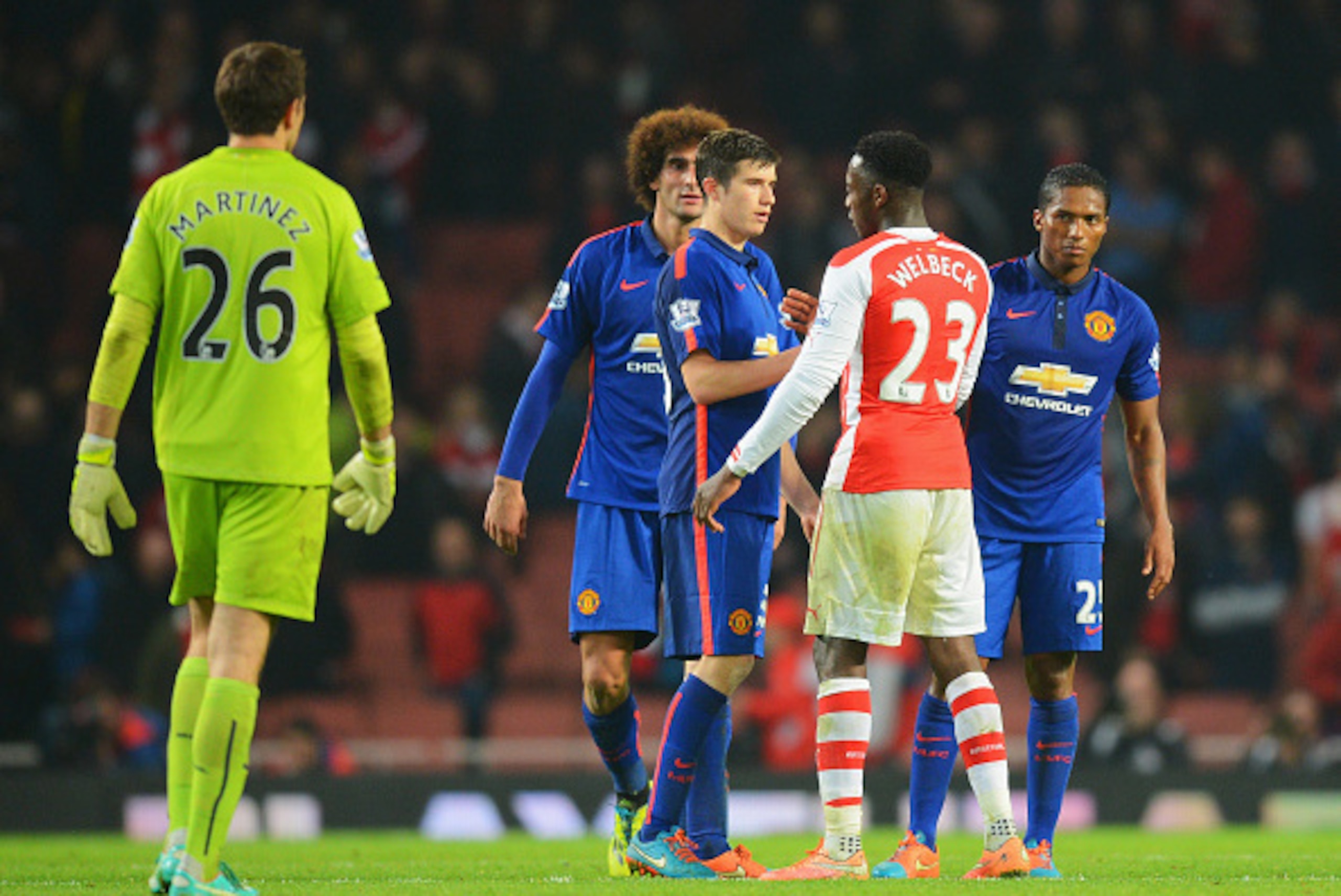 LONDON, ENGLAND - NOVEMBER 22: Paddy McNair of Manchester United shakes hands with Danny Welbeck of Arsenal after the Barclays Premier League match between Arsenal and Manchester United at Emirates Stadium on November 22, 2014 in London, England. (Photo LONDON, ENGLAND - NOVEMBER 22: Paddy McNair of Manchester United shakes hands with Danny Welbeck of Arsenal after the Barclays Premier League match between Arsenal and Manchester United at Emirates Stadium on November 22, 2014 in London, England. (Photo