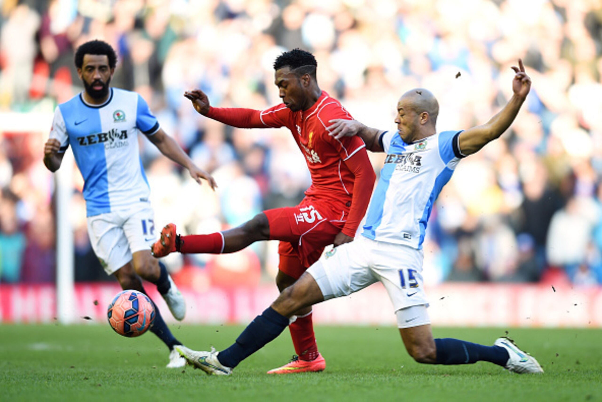 LIVERPOOL, ENGLAND - MARCH 08: Daniel Sturridge of Liverpool is tackled by Alex Baptiste of Blackburn during the FA Cup Quarter Final match between Liverpool and Blackburn Rovers at Anfield on March 8, 2015 in Liverpool, England. (Photo by Michael Regan LIVERPOOL, ENGLAND - MARCH 08: Daniel Sturridge of Liverpool is tackled by Alex Baptiste of Blackburn during the FA Cup Quarter Final match between Liverpool and Blackburn Rovers at Anfield on March 8, 2015 in Liverpool, England. (Photo by Michael Regan