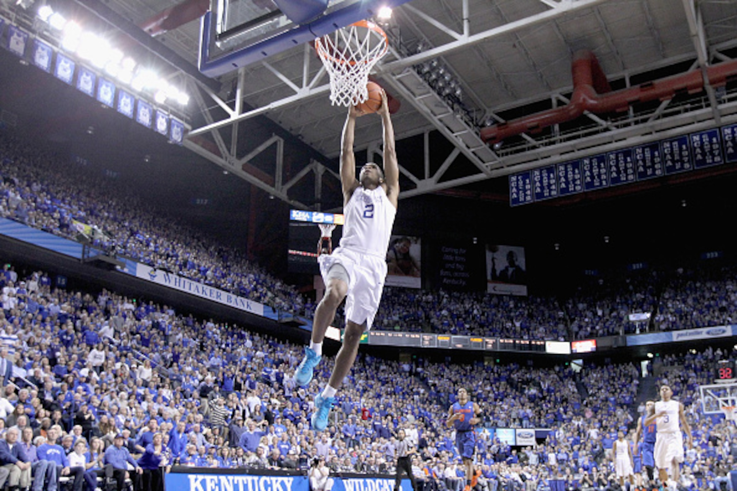 LEXINGTON, KY - MARCH 07:  Aaron Harrison #2 of the Kentucky Wildcats dunks the ball during the game against the Florida Gators at Rupp Arena on March 7, 2015 in Lexington, Kentucky.  (Photo by Andy Lyons/Getty Images)