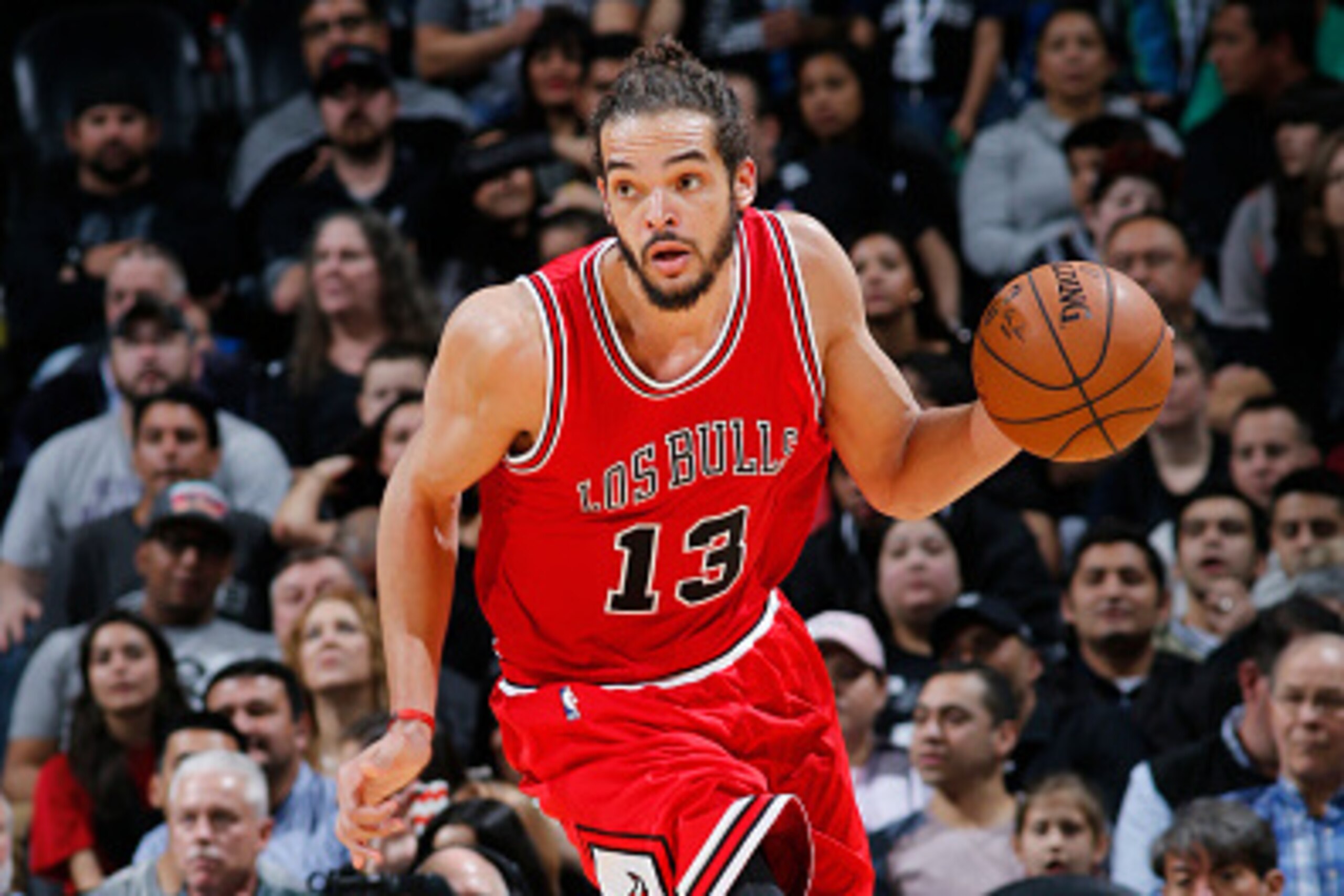 SAN ANTONIO, TX - MARCH 8: Joakim Noah #13 of the Chicago Bulls drives to the basket against the San Antonio Spurs during the game at AT&T Center on March 8, 2015 in San Antonio, Texas. NOTE TO USER: User expressly acknowledges and agrees that, by downloa