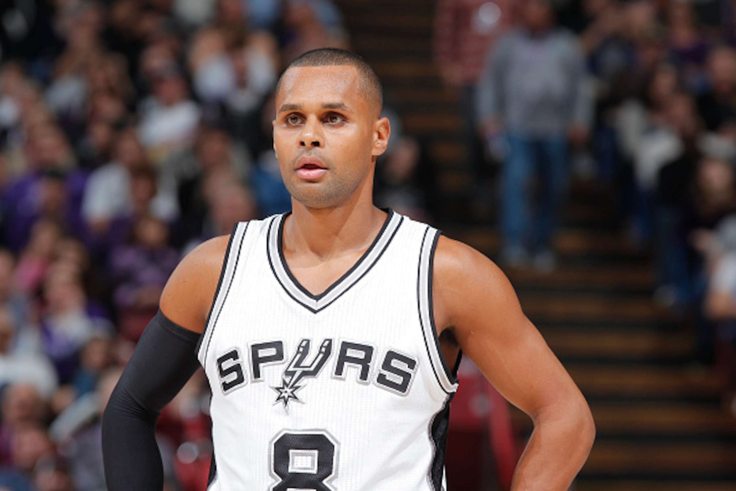 SACRAMENTO, CA - FEBRUARY 27: Patty Mills #8 of the San Antonio Spurs looks on during the game against the Sacramento Kings on February 27, 2015 at Sleep Train Arena in Sacramento, California. NOTE TO USER: User expressly acknowledges and agrees that, by 