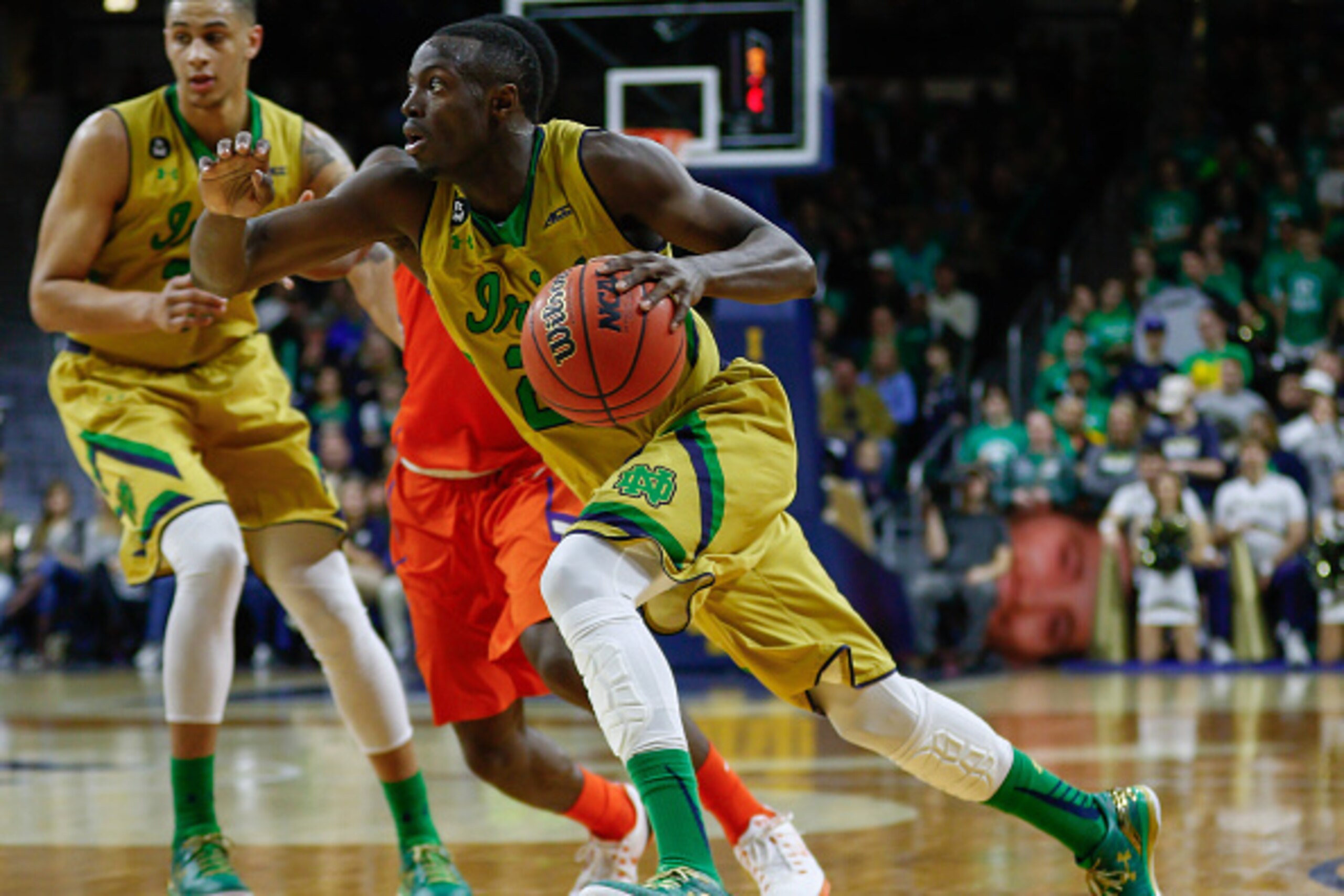 SOUTH BEND, IN - MARCH 07: Jerian Grant #22 of the Notre Dame Fighting Irish drives to the basket during the game against the Clemson Tigers at Purcell Pavilion on March 7, 2015 in South Bend, Indiana. Notre Dame defeated Clemson 81-67. (Photo by Michael 