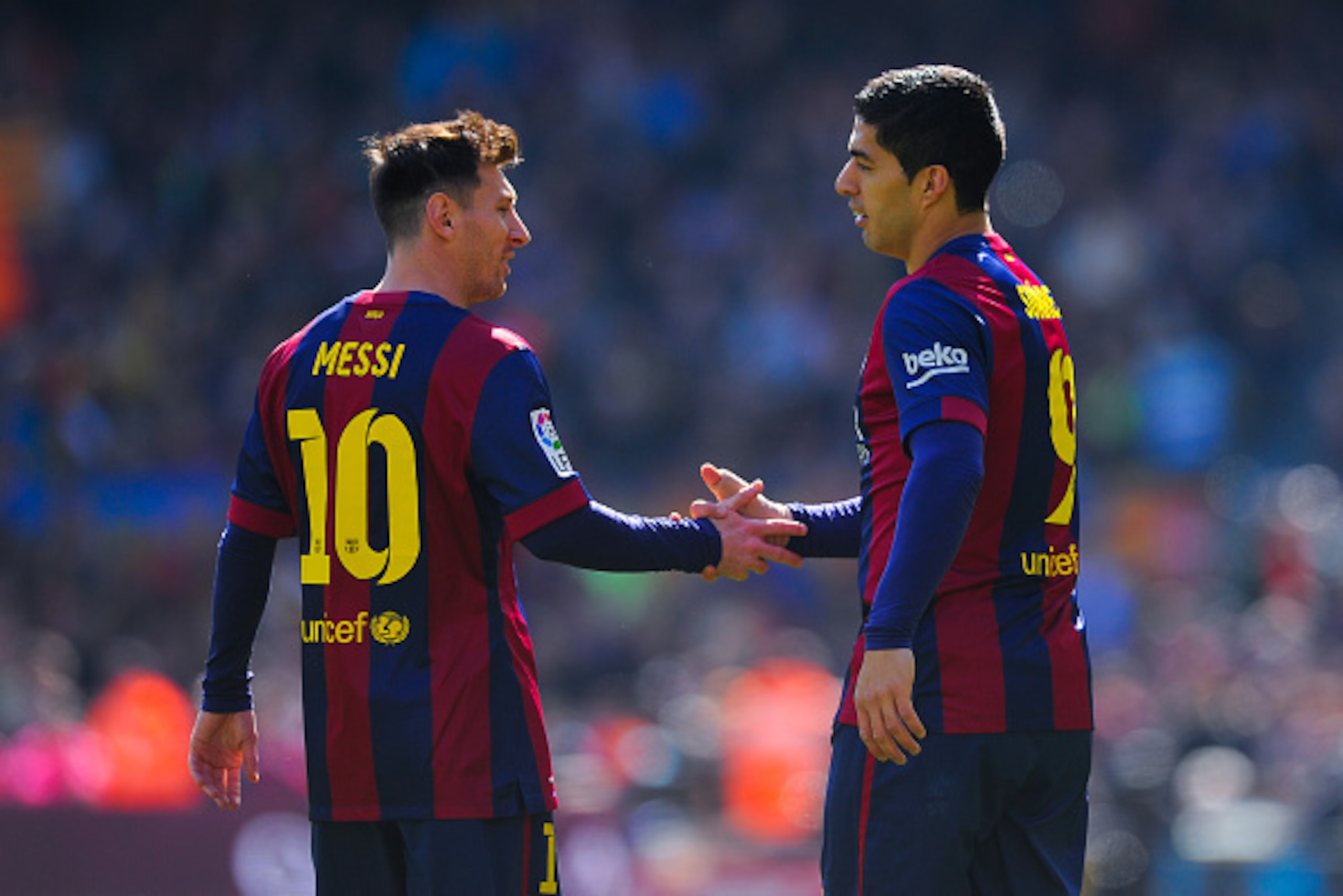 BARCELONA, SPAIN - MARCH 08: Luis Suarez (R) of FC Barcelona celebrates with his teammate Lionel Messi of FC Barcelona after scoring the opening goal during the La Liga match between FC Barcelona and Rayo Vallecano de Madrid at Camp Nou on March 8, 2015 BARCELONA, SPAIN - MARCH 08: Luis Suarez (R) of FC Barcelona celebrates with his teammate Lionel Messi of FC Barcelona after scoring the opening goal during the La Liga match between FC Barcelona and Rayo Vallecano de Madrid at Camp Nou on March 8, 2015