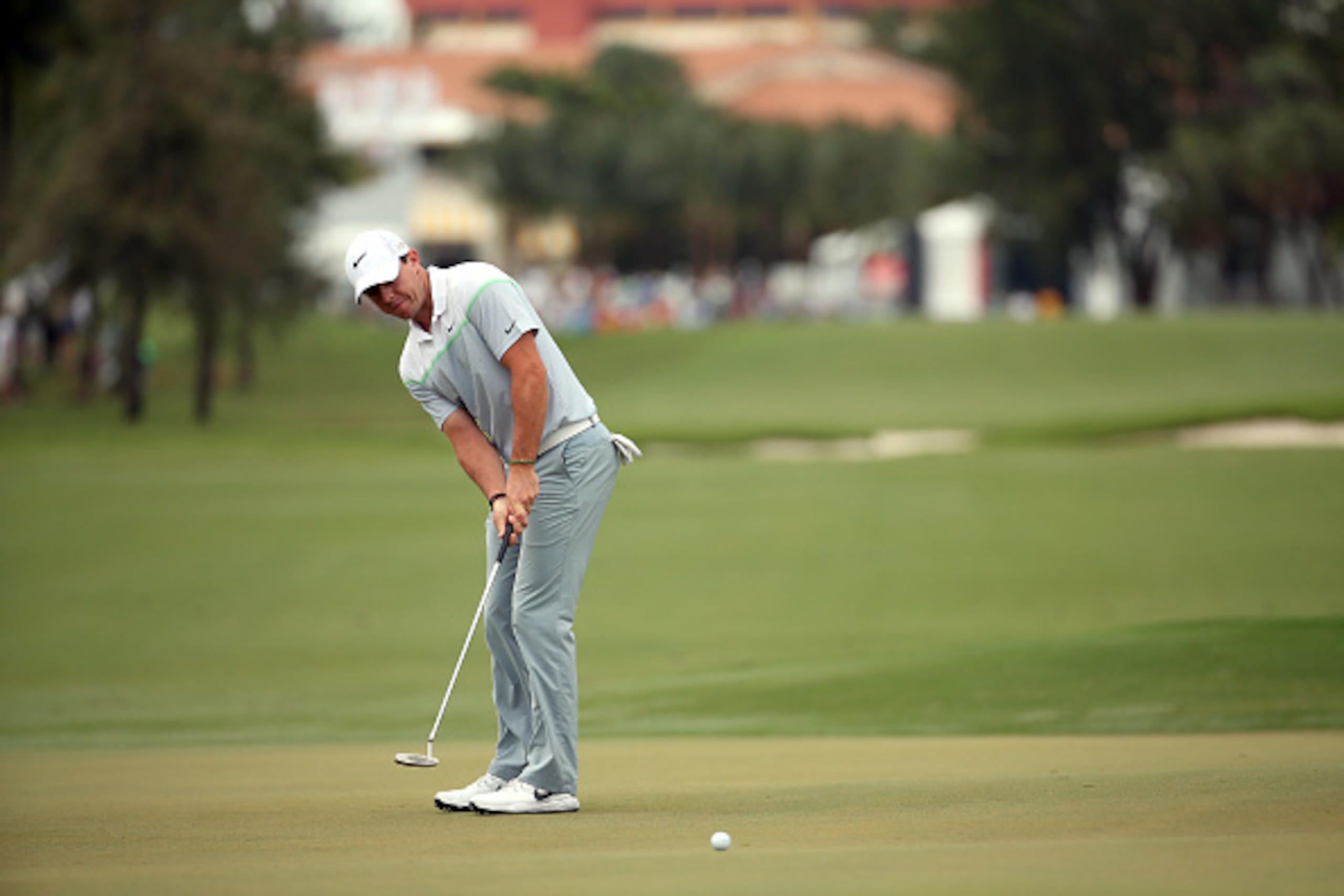 DORAL, FL - MARCH 08:  Rory McIlroy of Northern Ireland putts on the first green during the final round of the World Golf Championships-Cadillac Championship at Trump National Doral Blue Monster Course on March 8, 2015 in Doral, Florida.  (Photo by Mike E