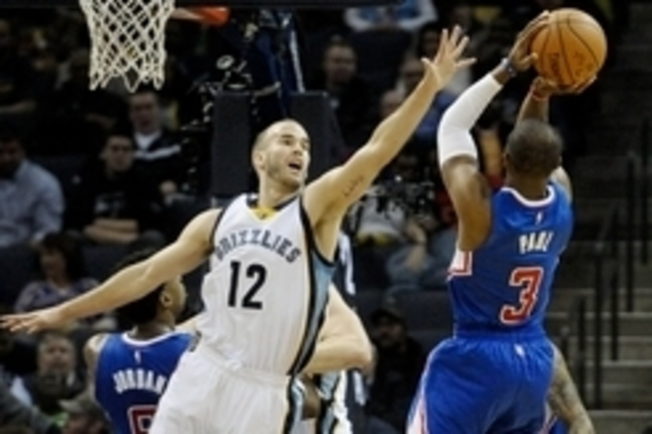 Feb 27, 2015; Memphis, TN, USA; Los Angeles Clippers guard Chris Paul (3) shoots against Memphis Grizzlies guard Nick Calathes (12) during the game at FedExForum. Mandatory Credit: Justin Ford-USA TODAY Sports