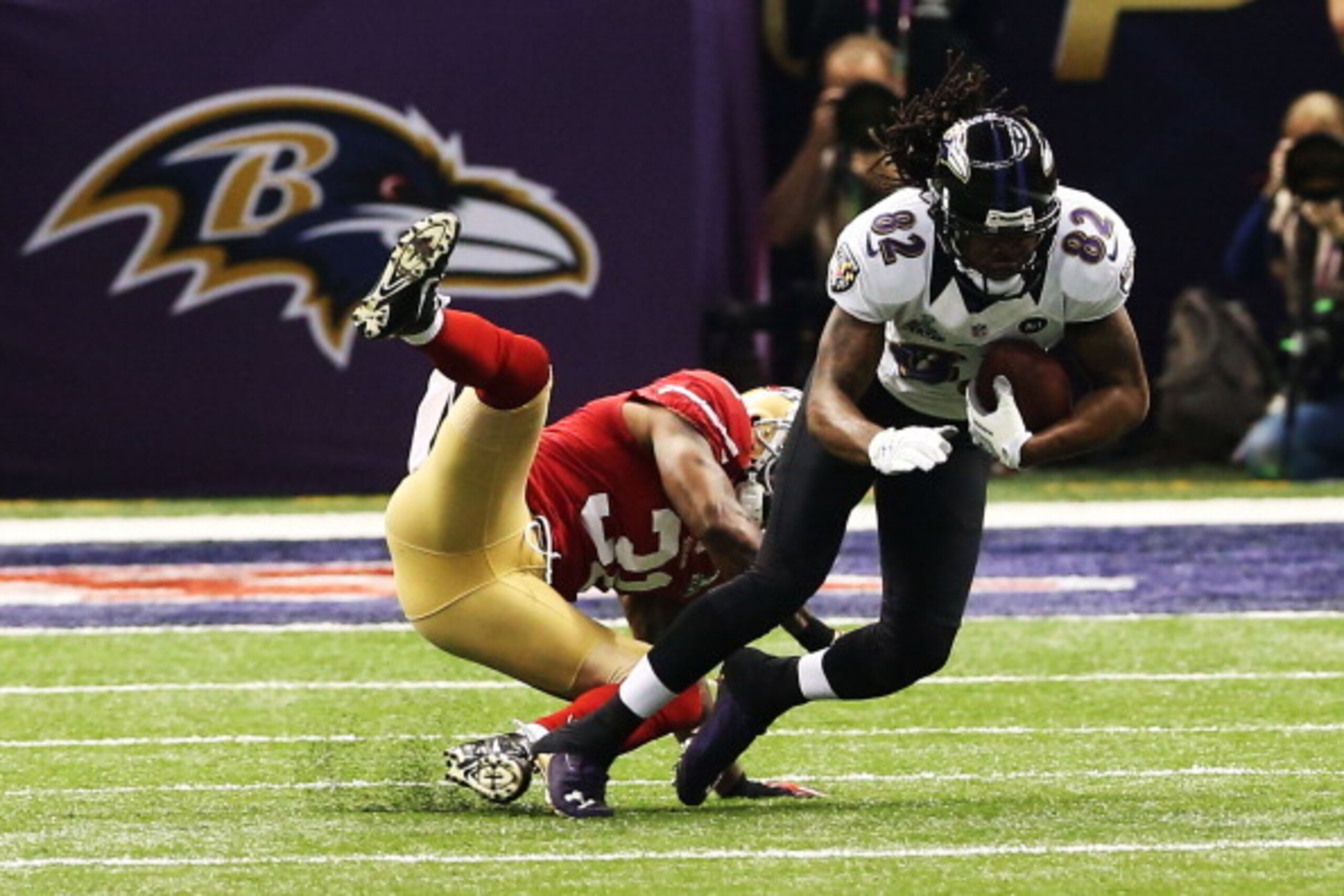 NEW ORLEANS, LA - FEBRUARY 03: Torrey Smith #82 of the Baltimore Ravens makes a 20-yard reception in the first quarter against Donte Whitner #31 of the San Francisco 49ers during Super Bowl XLVII at the Mercedes-Benz Superdome on February 3, 2013 in New NEW ORLEANS, LA - FEBRUARY 03: Torrey Smith #82 of the Baltimore Ravens makes a 20-yard reception in the first quarter against Donte Whitner #31 of the San Francisco 49ers during Super Bowl XLVII at the Mercedes-Benz Superdome on February 3, 2013 in New