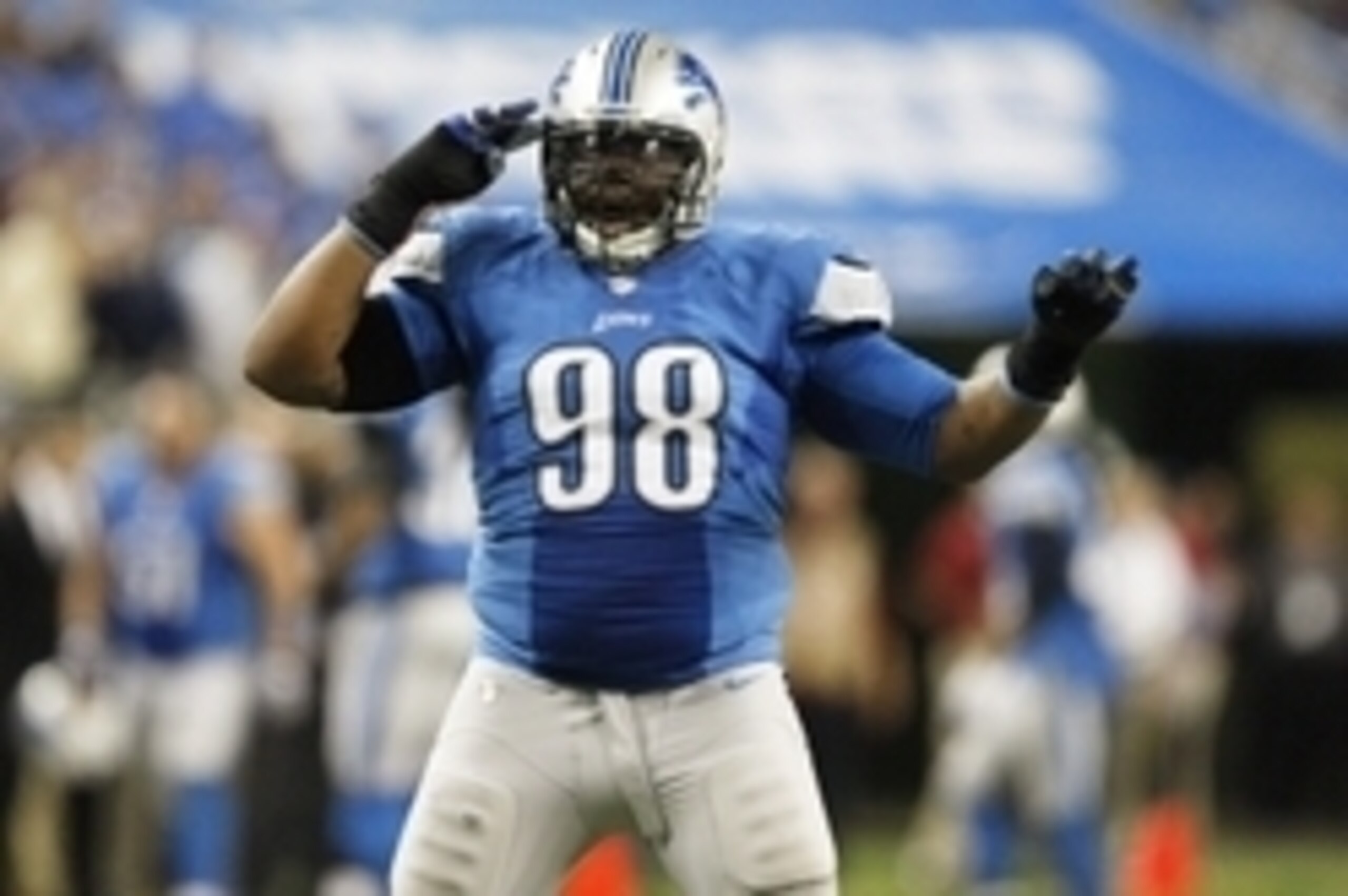Dec 22, 2013; Detroit, MI, USA; Detroit Lions defensive tackle Nick Fairley (98) celebrates after making a play during the fourth quarter against the New York Giants at Ford Field. Giants beat the Lions 23-20. Mandatory Credit: Raj Mehta-USA TODAY Sports