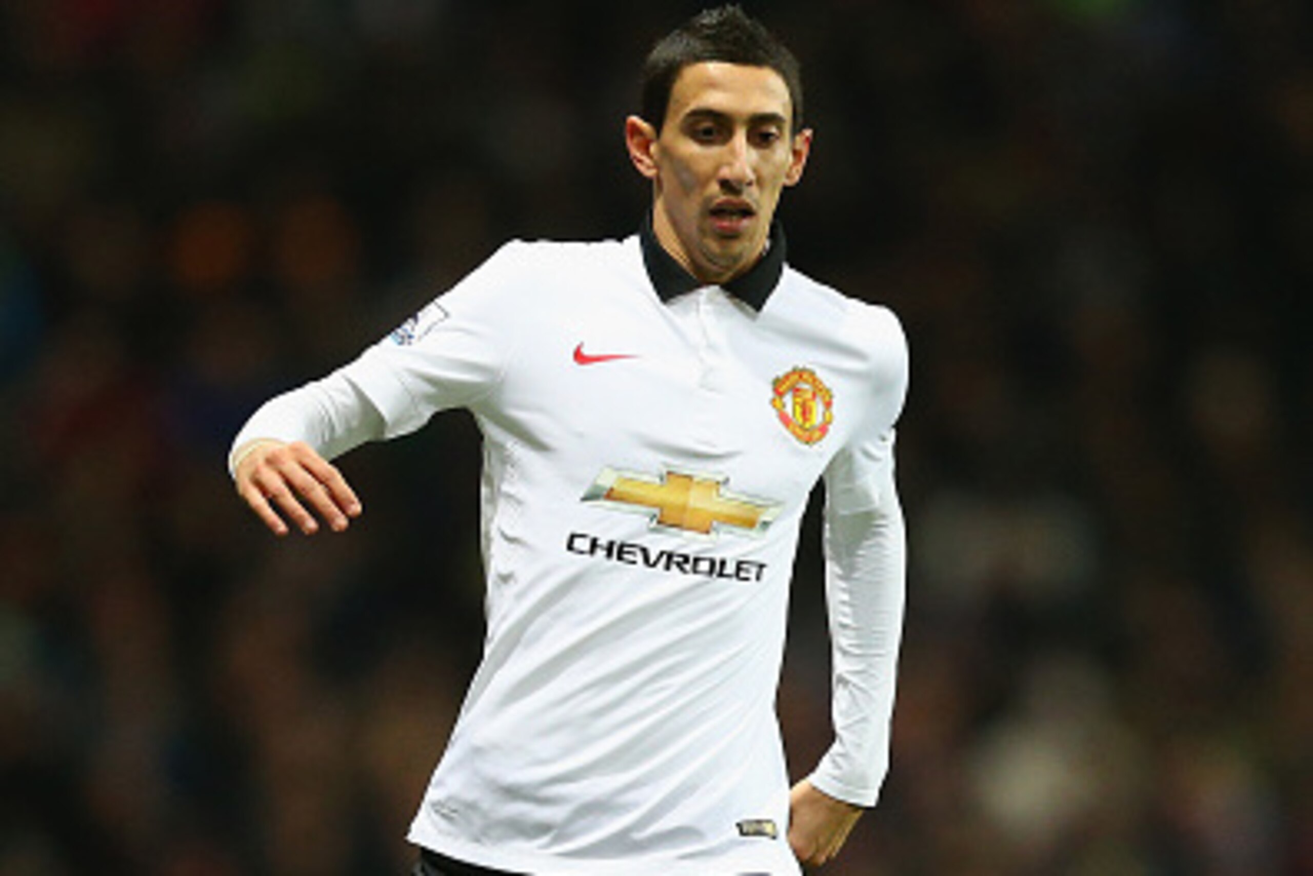 BIRMINGHAM, ENGLAND - DECEMBER 20:  Angel di Maria of Manchester United on the ball during the Barclays Premier League match between Aston Villa and Manchester United at Villa Park on December 20, 2014 in Birmingham, England.  (Photo by Clive Mason/Getty 