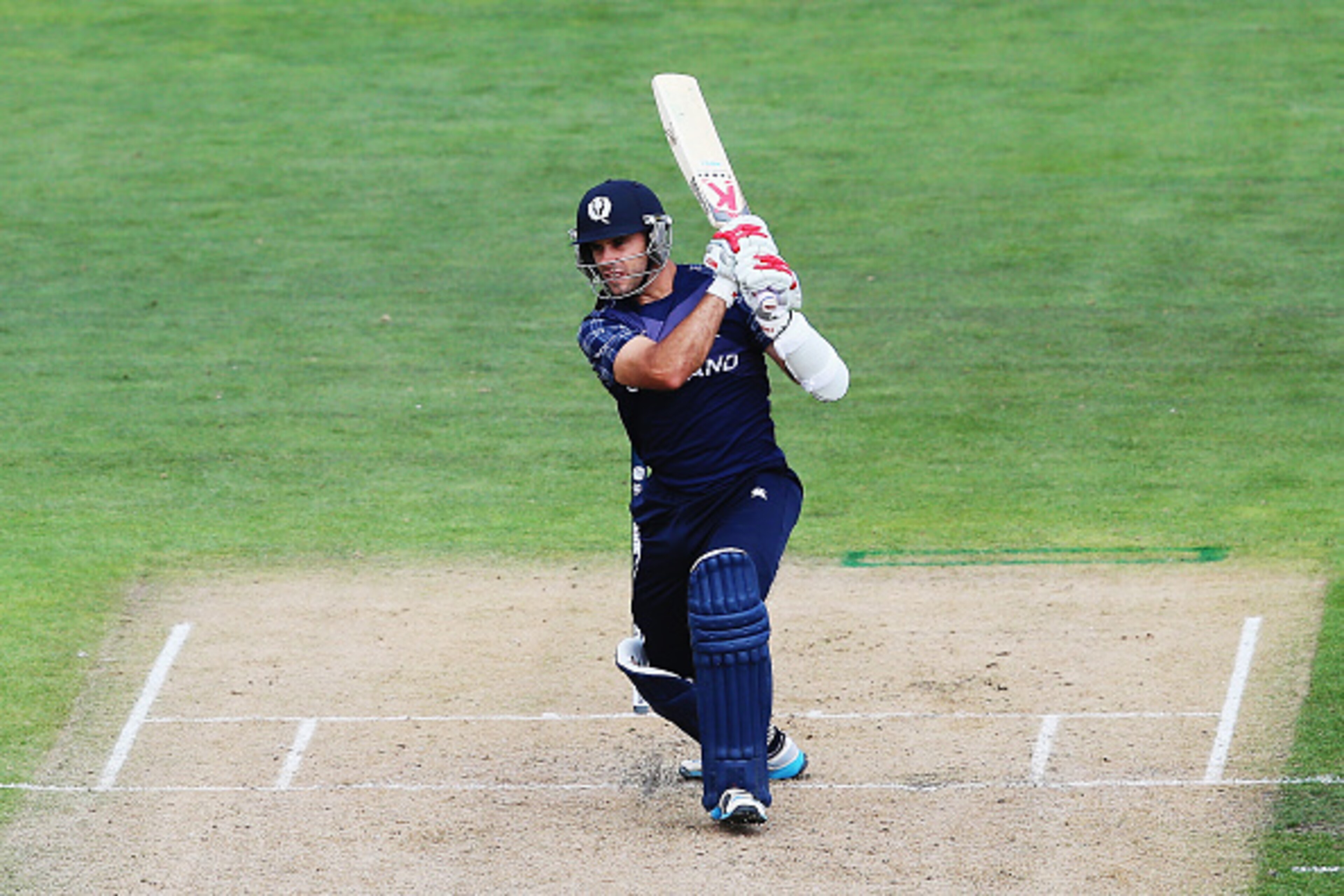 NELSON, NEW ZEALAND - MARCH 05:  Kyle Coetzer of Scotland drives the ball away for four runs during the 2015 ICC Cricket World Cup match between Bangladesh and Scotland at Saxton Field on March 5, 2015 in Nelson, New Zealand.  (Photo by Hannah Peters/Gett