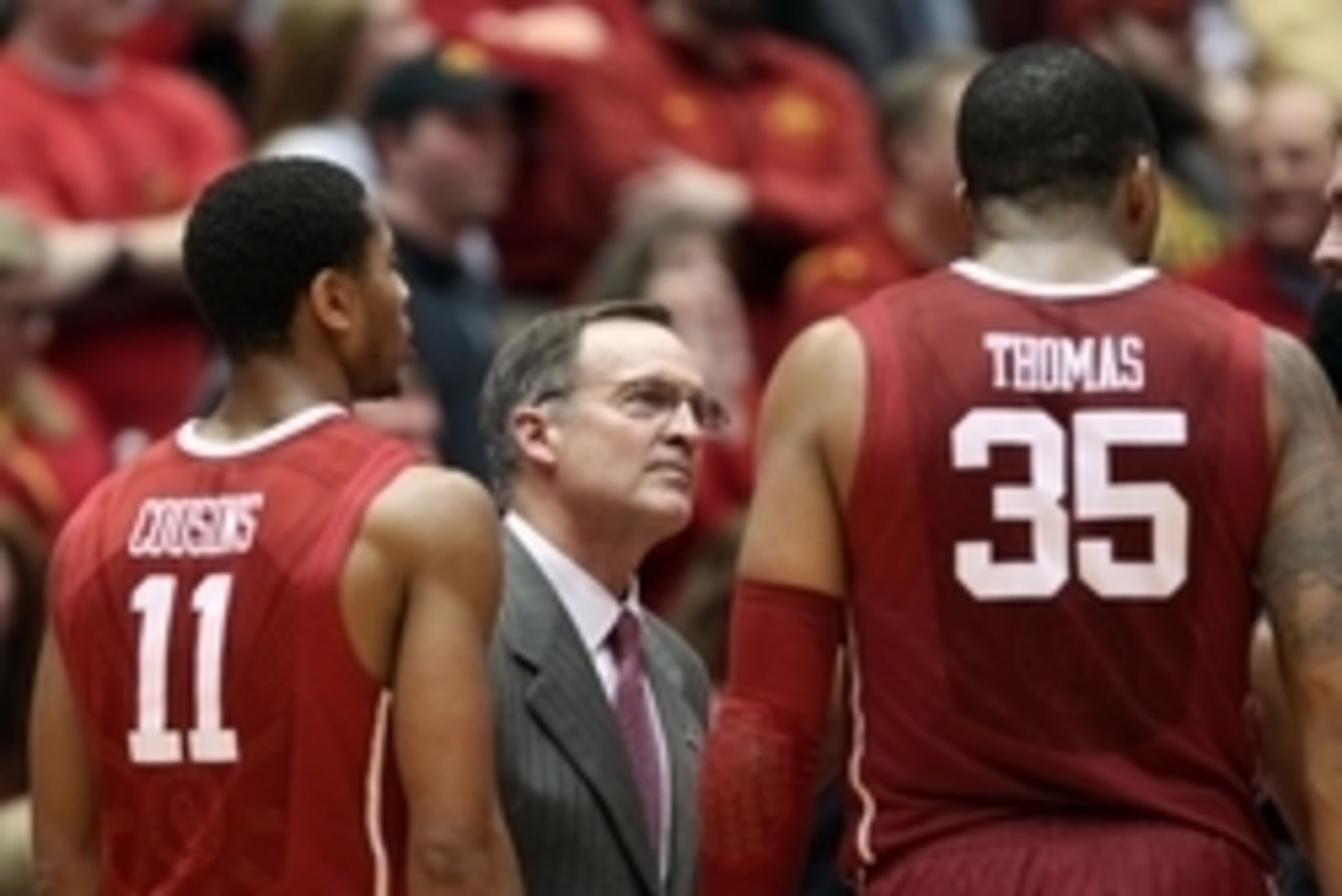 Mar 2, 2015; Ames, IA, USA; Oklahoma Sooners head coach Lon Kruger talks to guard Isaiah Cousins (11) and forward TaShawn Thomas (35) during their game with the Iowa State Cyclones at James H. Hilton Coliseum. Iowa State beat Oklahoma 77-70. Mandatory Cre Mar 2, 2015; Ames, IA, USA; Oklahoma Sooners head coach Lon Kruger talks to guard Isaiah Cousins (11) and forward TaShawn Thomas (35) during their game with the Iowa State Cyclones at James H. Hilton Coliseum. Iowa State beat Oklahoma 77-70. Mandatory Cre
