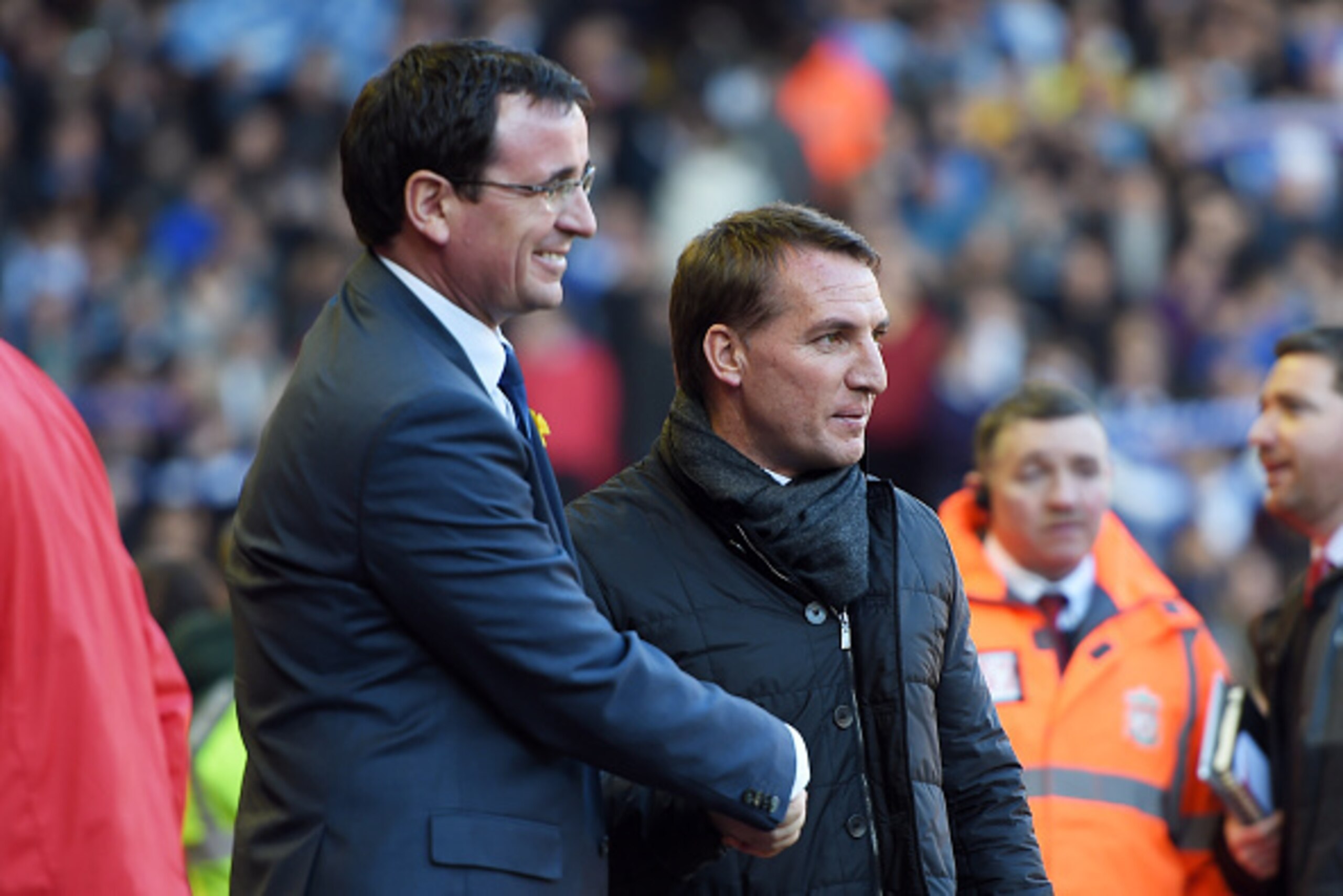 LIVERPOOL, ENGLAND - MARCH 08:  Opposing managers Gary Bowyer the manager of  Blackburn and Brendan Rodgers the manager of Liverpool pose for a photo prior to kickoff during the FA Cup Quarter Final match between Liverpool and Blackburn Rovers at Anfield 